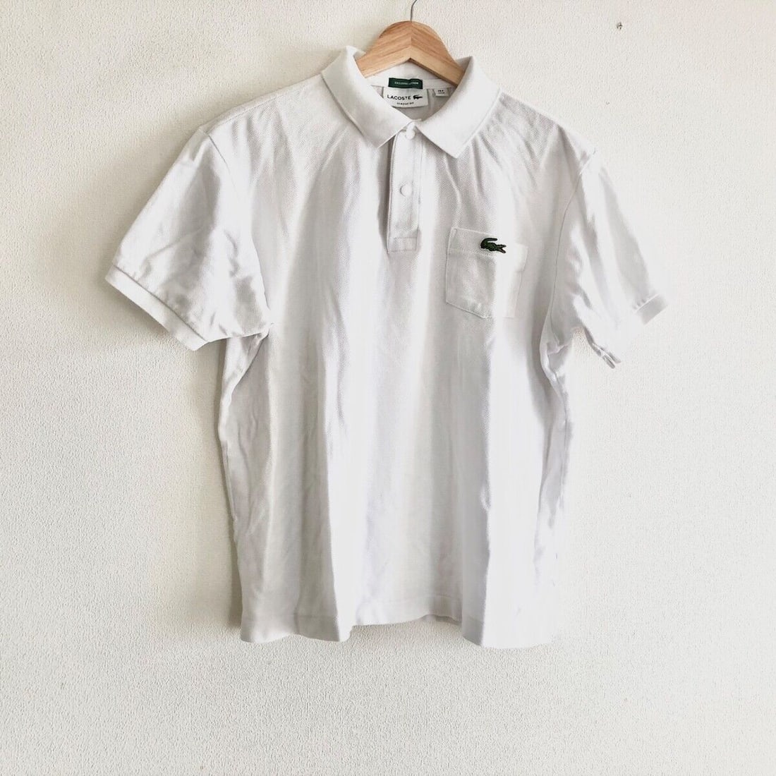 Authentic Lacoste - White Polo Shirt: Authentic Lacoste - White Polo Shirt Condition: Pre-owned Brand: Lacoste Style: Polo Shirt Color: White Material: Please see the photo of the quality tag ConditionRank: 6 Department: Mens