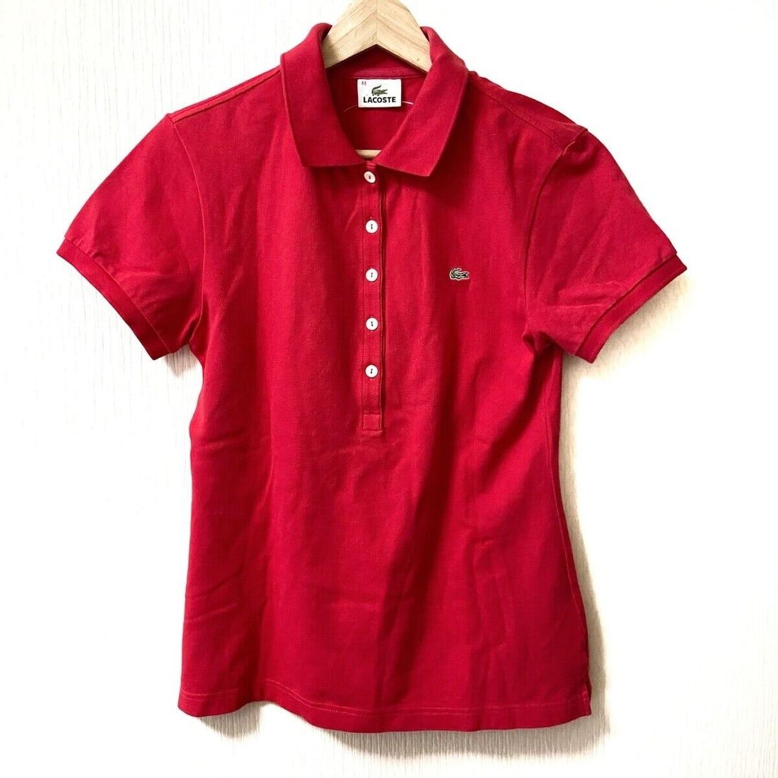 Auth Lacoste - Red Womens Polo: Auth Lacoste - Red Womens Polo Shirt Condition: Pre-owned Brand: Lacoste Style: Polo Shirt Color: Red Material: Please see the photo of the quality tag ConditionRank: 6 Department: Womens