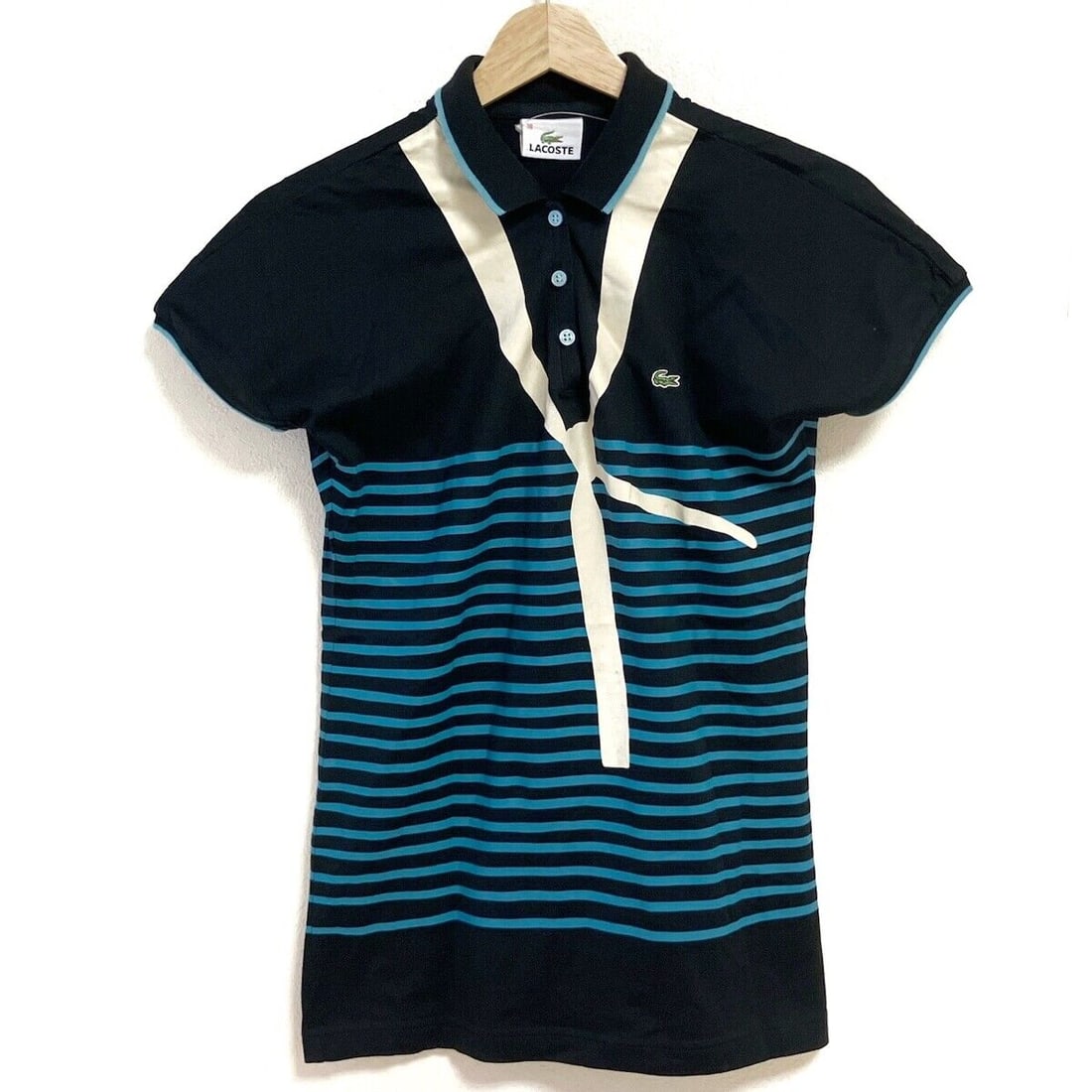 Auth Lacoste - Black Blue Green: Auth Lacoste - Black Blue Green Cream Womens Polo Shirt Condition: Pre-owned Brand: Lacoste Style: Polo Shirt Color: Black, Blue Green, Cream Material: Please see the photo of the quality tag Cond