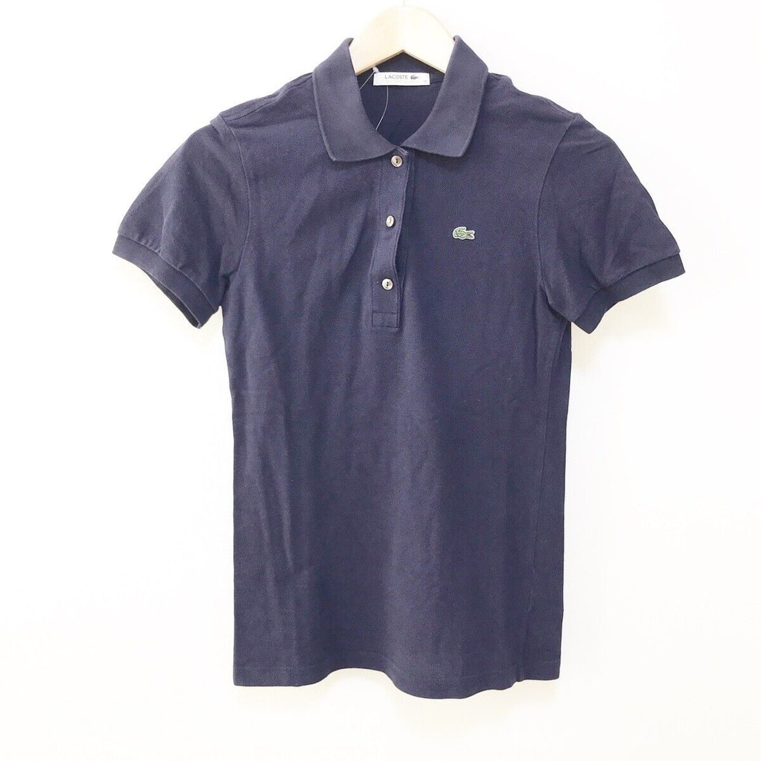 Auth Lacoste - Navy Womens Polo: Auth Lacoste - Navy Womens Polo Shirt Condition: Pre-owned Brand: Lacoste Style: Polo Shirt Color: Navy Material: Please see the photo of the quality tag ConditionRank: 6 Department: Wome
