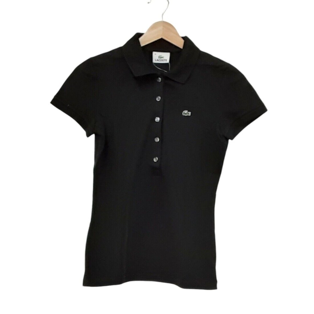 Auth Lacoste - Black Womens Polo: Auth Lacoste - Black Womens Polo Shirt Condition: Pre-owned Brand: Lacoste Style: Polo Shirt Color: Black Material: Please see the photo of the quality tag ConditionRank: 6 Department: Wo