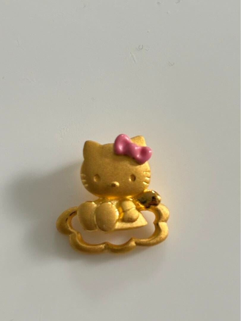 Hello Kitty Sanrio Necklace Top Pure: Hello Kitty Sanrio Necklace Top Pure Gold K24 Used Very Rare Condition: Used Important Notes: ?Weight: 4.14 g of pure gold Size: approx. 1 cm x 1 cm No noticeable stains or scratches? Convention/Event