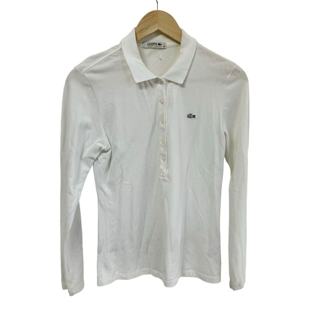 Auth Lacoste - White Womens Polo: Auth Lacoste - White Womens Polo Shirt Condition: Pre-owned Brand: Lacoste Style: Polo Shirt Color: White Material: Please see the photo of the quality tag ConditionRank: 6 Department: Wo