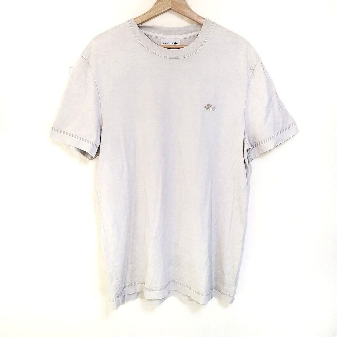 Auth Lacoste - Cream Mens T-Shirt: Auth Lacoste - Cream Mens T-Shirt Condition: Pre-owned Brand: Lacoste Style: T-Shirt Color: Cream Material: Please see the photo of the quality tag ConditionRank: 9 Department: Mens <
