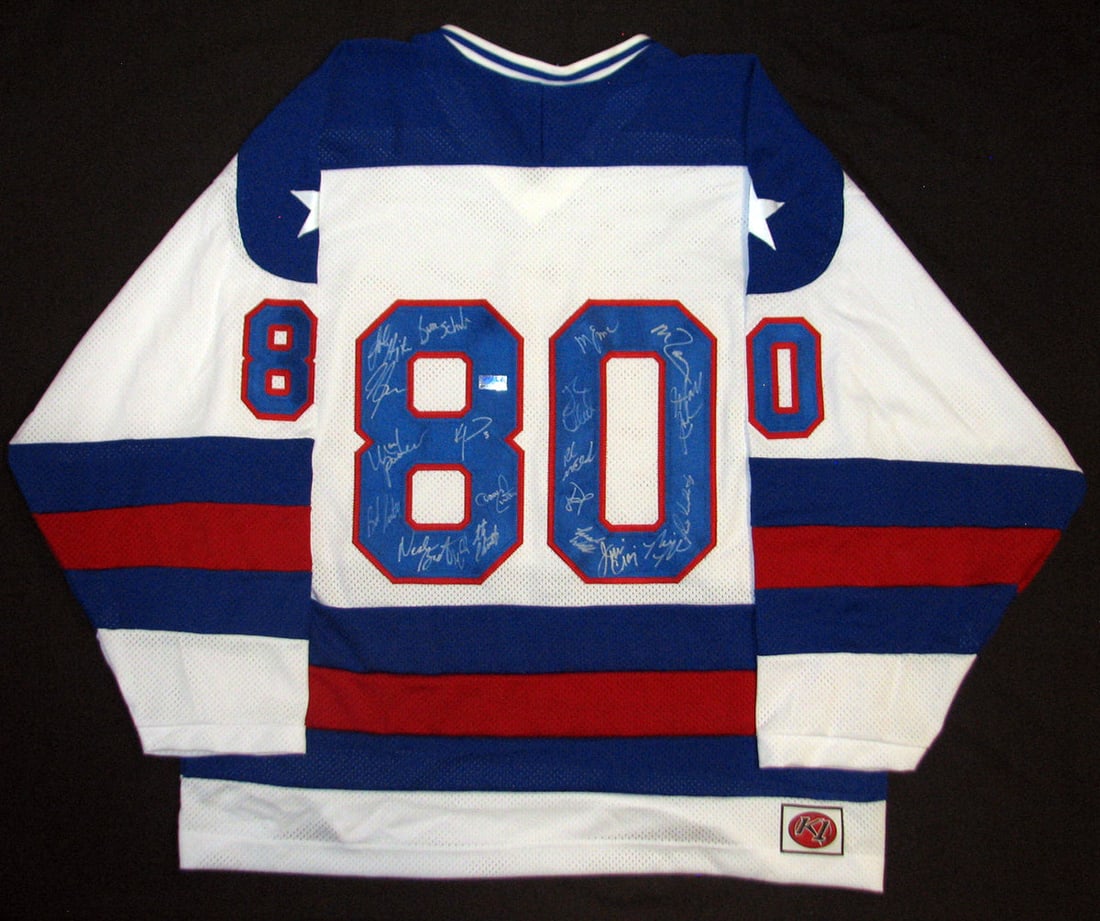 usa miracle on ice 1980 team signed jersey - all 20 player autos - grandstand sports holo & COA: usa miracle on ice 1980 team signed jersey - all 20 player autos - grandstand sports holo & COA Featured is a 1980 USA Hockey team signed custom hockey jersey. This jersey has been signed by all 20 me