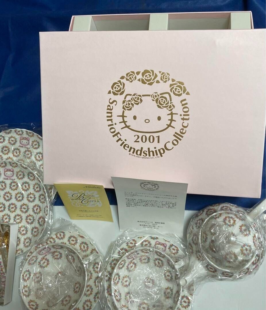 Sanrio Hello Kitty Tea Cup Set: Sanrio Hello Kitty Tea Cup Set 2001 Limited Noritake Tableware Rare Unused Condition: Used Brand: Sanrio Type: Cup,Teapot,Plate Character: Hello Kitty Color: multicolor Material: pottery