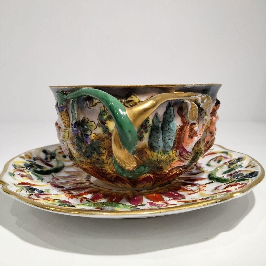 Capodimonte Cup Saucer Relief Figure 1900: Capodimonte Cup Saucer Relief Figure 1900 Early T Used Condition: Used Brand: Richard Ginori Type: NA Theme: NA Time Period Manufactured: NA Country/Region of Manufacture: NA Production T