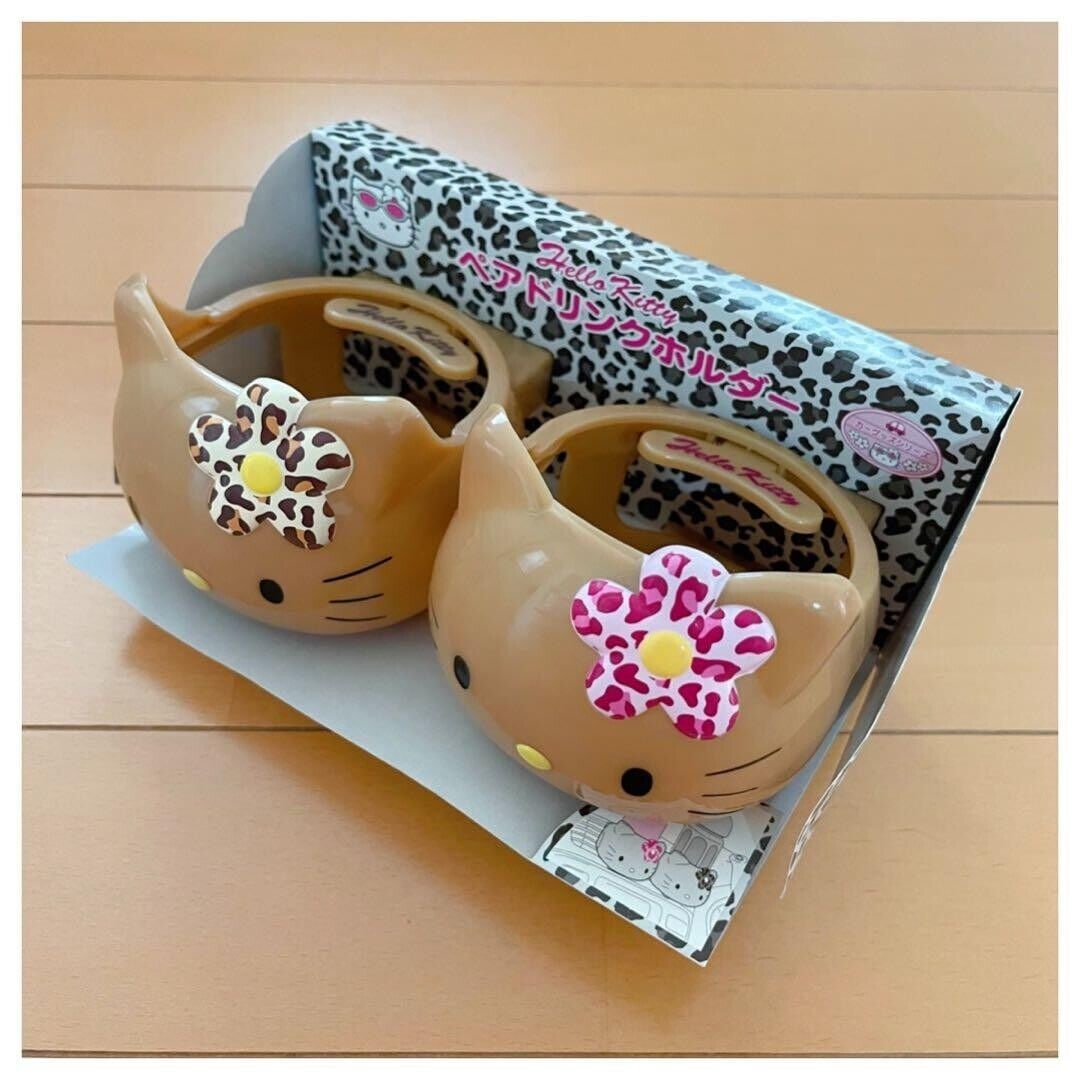 Sanrio Hello Kitty Pair Drink Holder: Sanrio Hello Kitty Pair Drink Holder Sunburn Leopard Print 2002 Very Rare Unused Condition: Used Brand: Sanrio Personalize: No Type: Drink Holder Country/Region of Manufacture: Japan SKU no: RBJ15