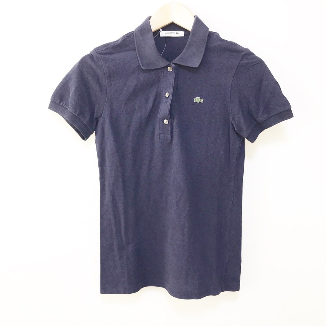 Auth Lacoste - Navy Womens Polo: Auth Lacoste - Navy Womens Polo Shirt Condition: Pre-owned Brand: Lacoste Style: Polo Shirt Color: Navy Material: Please see the photo of the quality tag ConditionRank: 6 Department: Wome