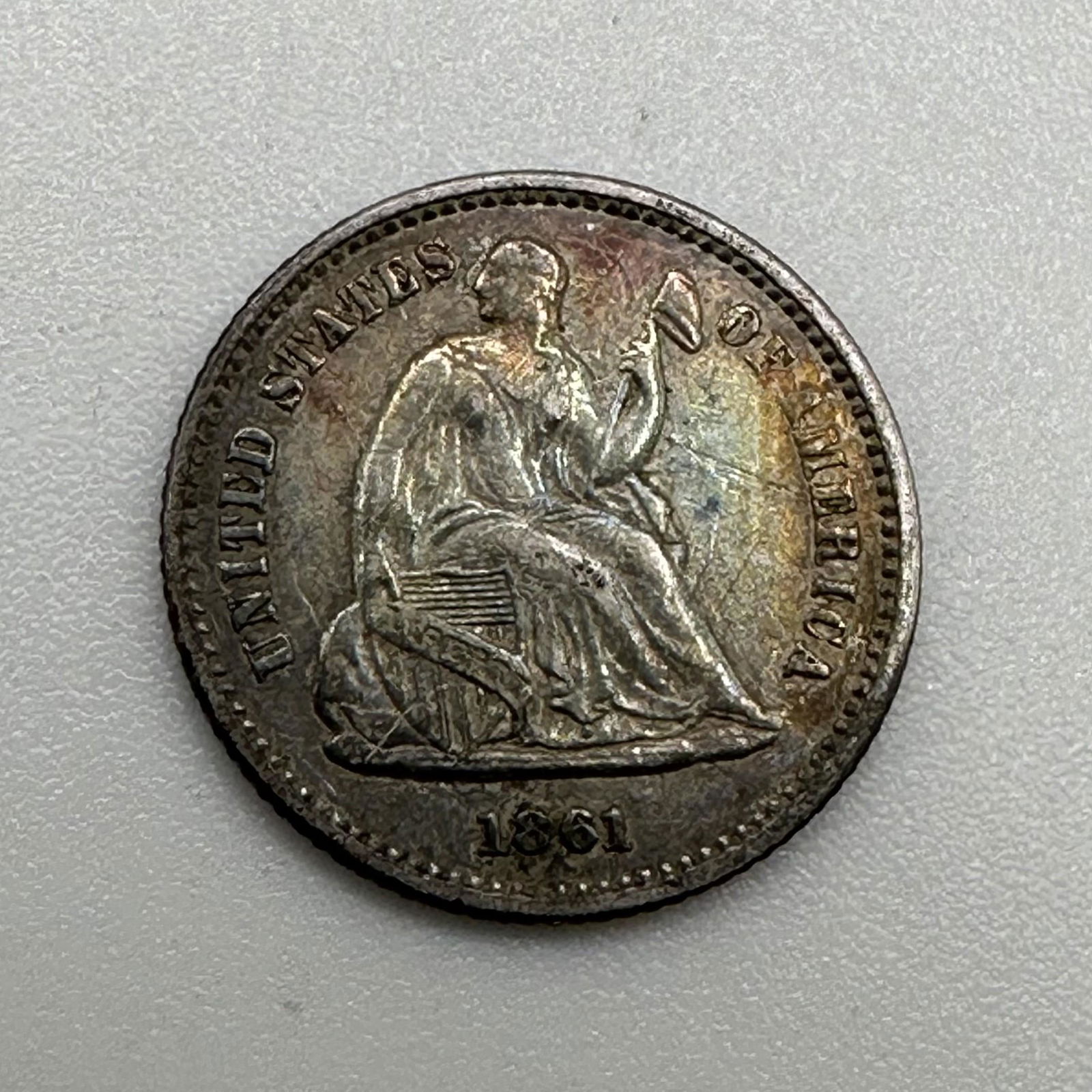 1861 Seated Liberty Half Dime (1 of 2)