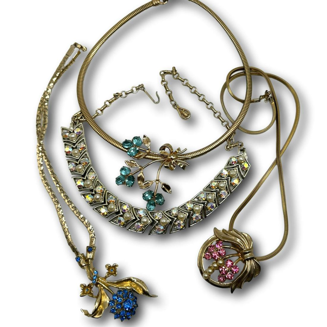 Vintage Rhinestone Necklaces including Coro & Vogue: PICKUP AND SHIPPING Local pickup is available in Glenview, IL by appointment. The address will be provided on your invoice at checkout. In-House shipping is available for this lot at a flat rate via U