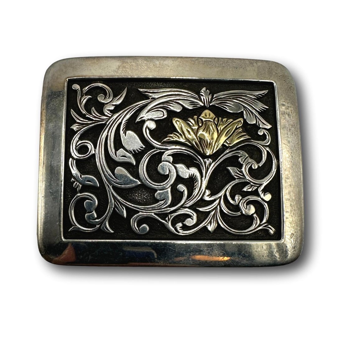 Sterling Silver and 18K Gold Belt Buckle: PICKUP AND SHIPPING Local pickup is available in Glenview, IL by appointment. The address will be provided on your invoice at checkout. In-House shipping is available for this lot at a flat rate via U