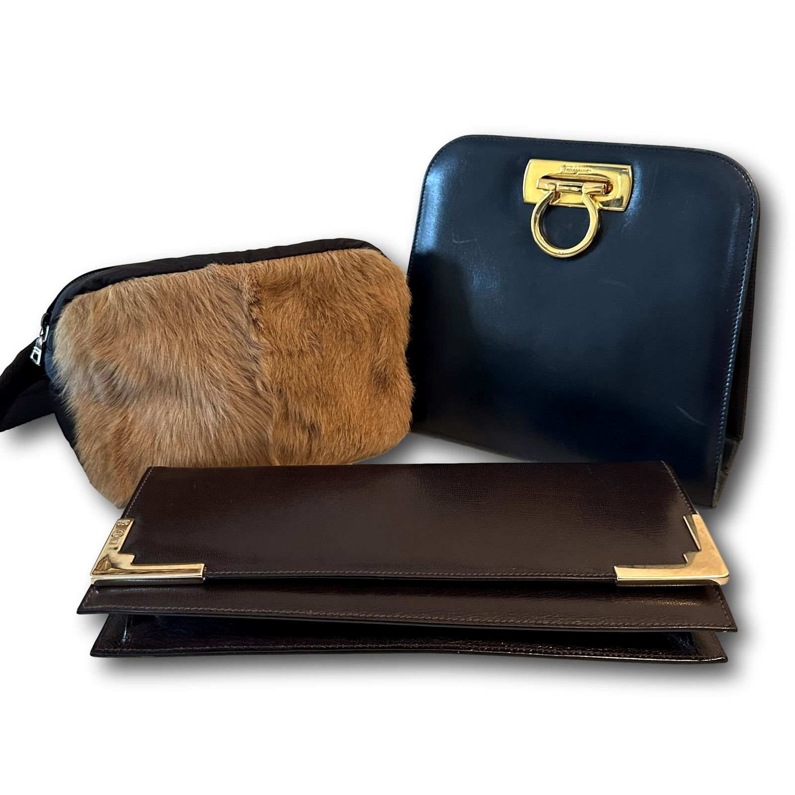 Prada, Ferragamo, Escada Purses Hand Bags: PICKUP AND SHIPPING Local pickup is available in Glenview, IL by appointment. The address will be provided on your invoice at checkout. In-House shipping is available for this lot at a flat rate via U