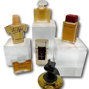 Lalique, Sonia Rykiel, Dolce & Gabbana, Tiffany, Cartier, Romeo Gigli - Lot of 6 Minis with Boxes: A collection of famous scents in miniature bottles with their original boxes. Perfumes and powders may not smell the same as they did when they were first created due to chemical changes over time