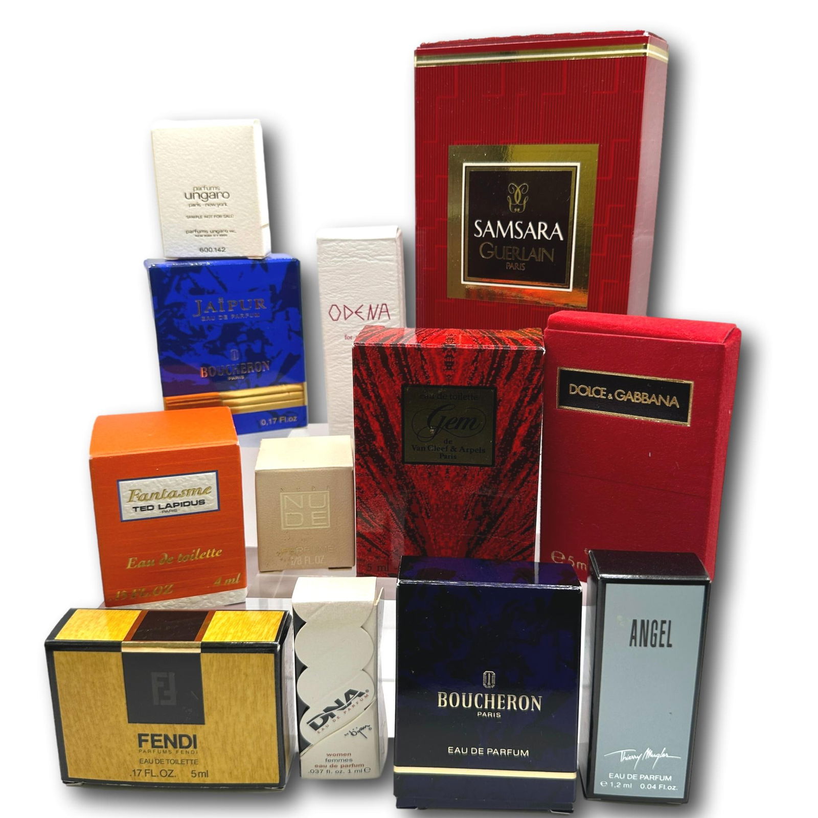 Guerlain, Fendi, Dolce & More Mini Perfumes, EDT and EDP in Original Boxes: Collection includes Guerlain Samsara, Dolce & Gabbana, Thierry Mugler Angel, Boucharon, Fendi, DNA, Odena, Ungaro, Jaipur, Van Cleef & Arpels Gem, Ted Lapidus Fantasme, and Nude. Most items are used o