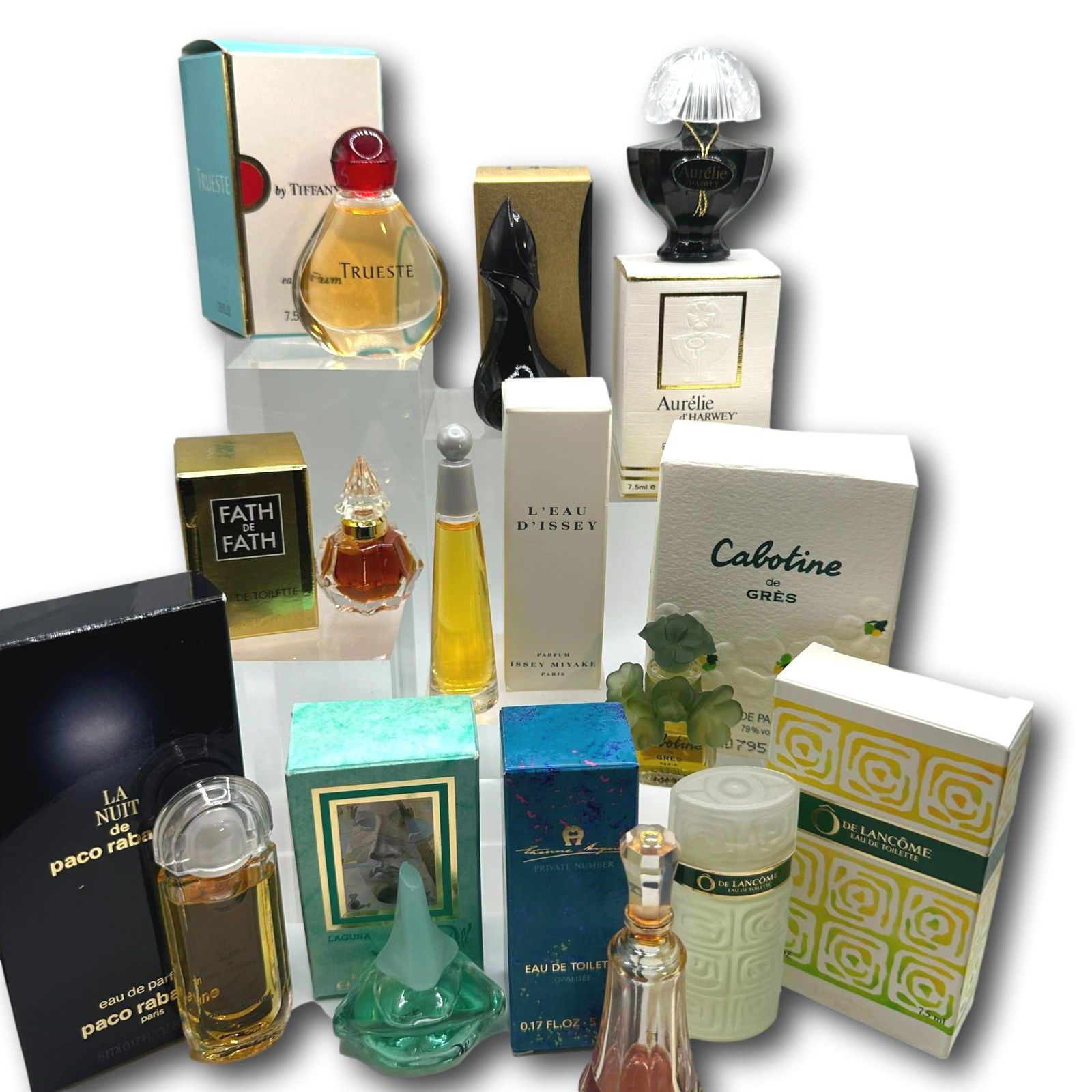 Tiffany, Lancome, Donna Karan, Escada & More Perfumes, EDT, EDP Miniatures: Most items are used or vintage and may show wear commensurate with age and use. Please inspect photos carefully as they are a part of the description. Perfumes and powders may not smell the same as th