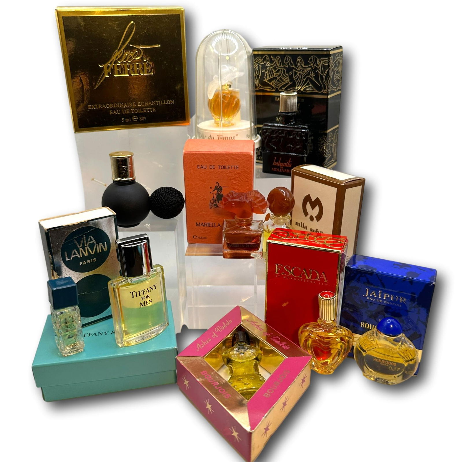 Tiffany, Lanvin, Escada, Ferre, Nina Ricci & More Perfumes, EDT, EDP Miniatures: Most items are used or vintage and may show wear commensurate with age and use. Please inspect photos carefully as they are a part of the description. Perfumes and powders may not smell the same as th