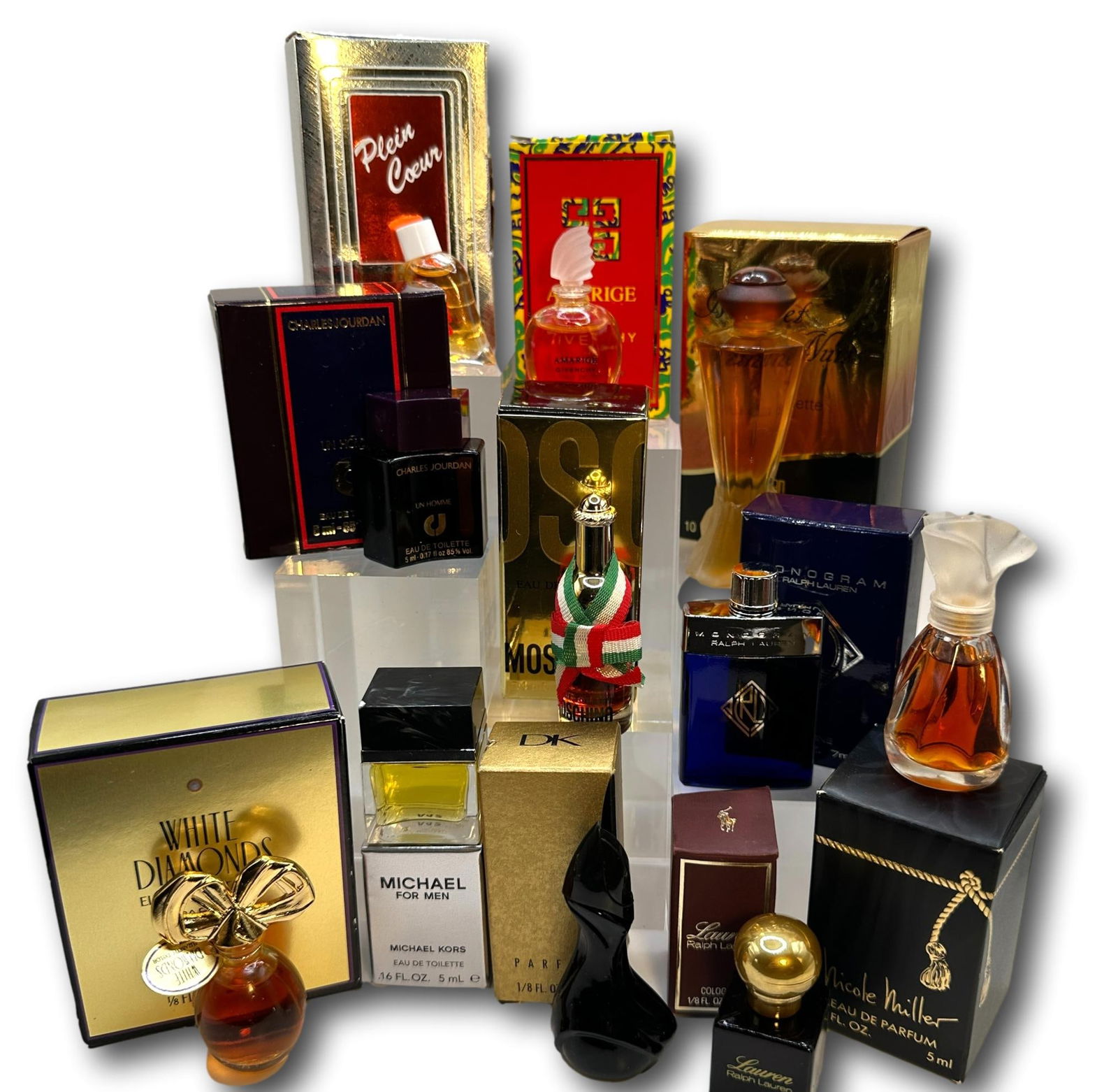 Kors, Karan, Akbar, Lauren, Moschino & More Perfume, EDT, EDP Miniatures: Most items are used or vintage and may show wear commensurate with age and use. Please inspect photos carefully as they are a part of the description. Perfumes and powders may not smell the same as th