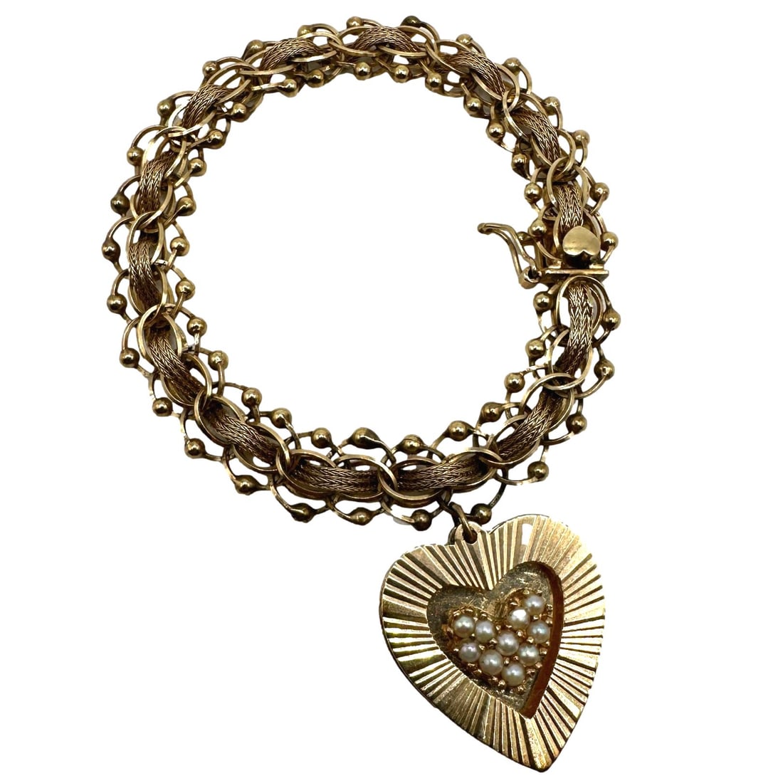 14K Gold Charm Bracelet with Heart and Pearl Pendant: Weighs 21.1 grams. Fits a smaller wrist. A perfect bracelet to add charms or wear as is.