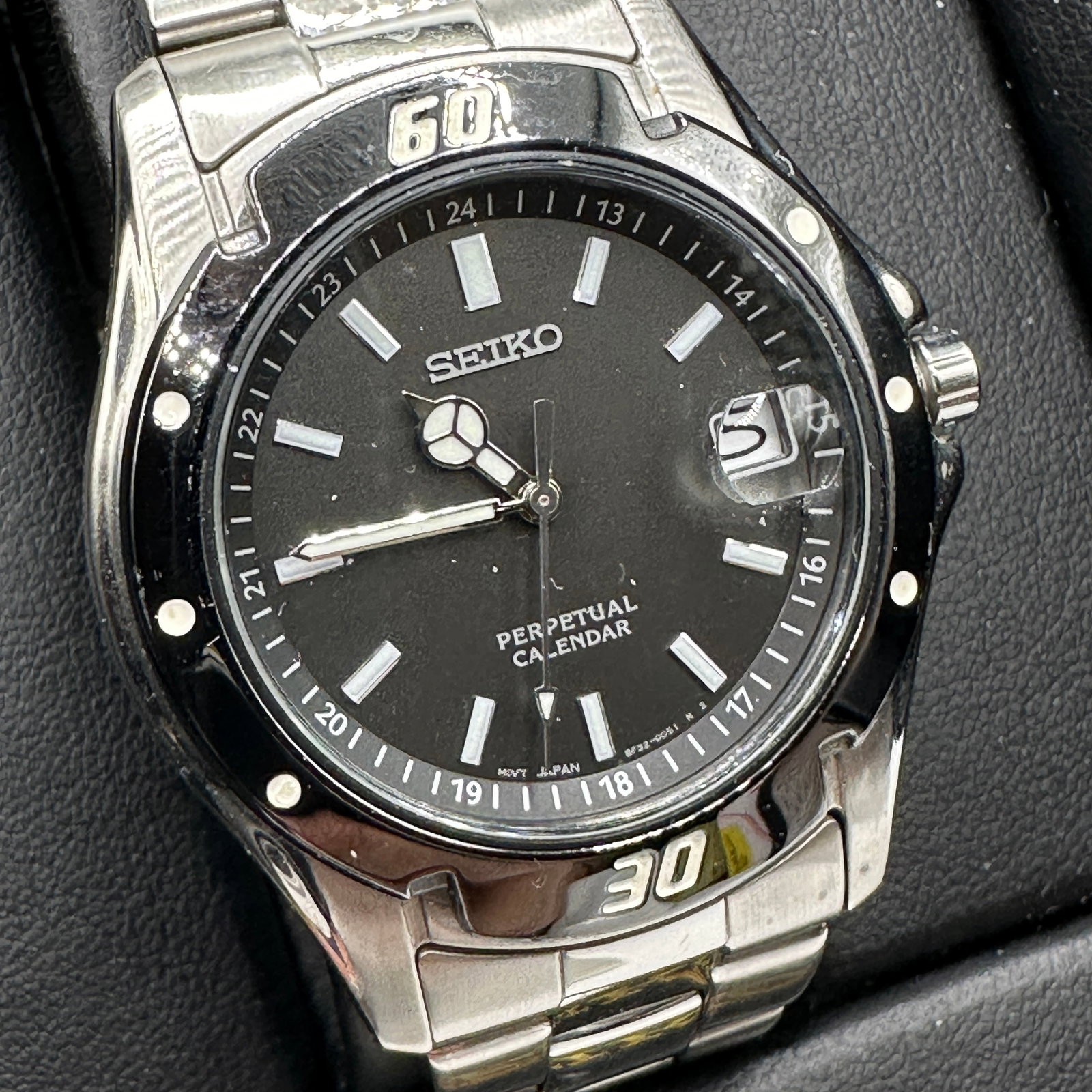 Seiko Stainless Steel Perpetual Calendar Wristwatch with Box: Model 8F32-00069, Serial #8N5183, includes box and original receipt. The Seiko Stainless Steel Perpetual Calendar Wristwatch 8F32-00069 is a remarkable timepiece that seamlessly blends timeless elegan