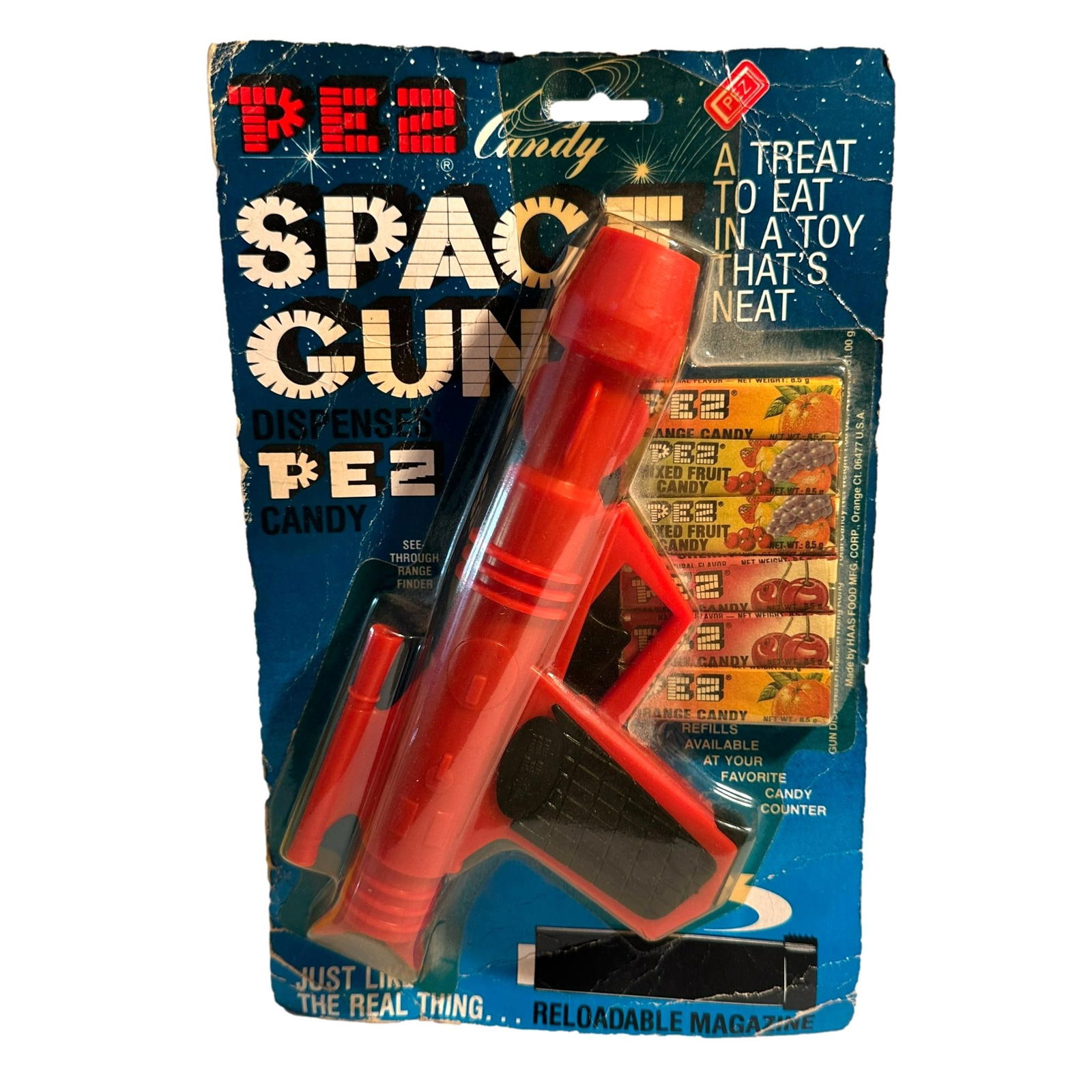 Vintage Pez Space Gun in Original Package: Item as shown in photos.