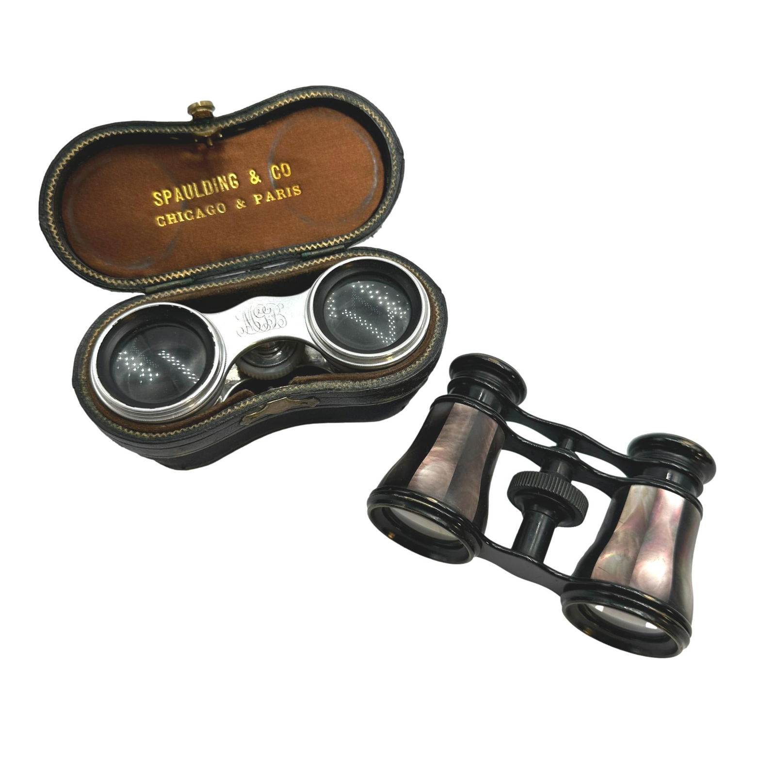 Pair of Mother of Pearl Opera Glasses: Please note lots may show signs of wear commensurate with age and use, and the lack of a statement regarding condition does not imply the lot is in perfect condition or completely free from defects or