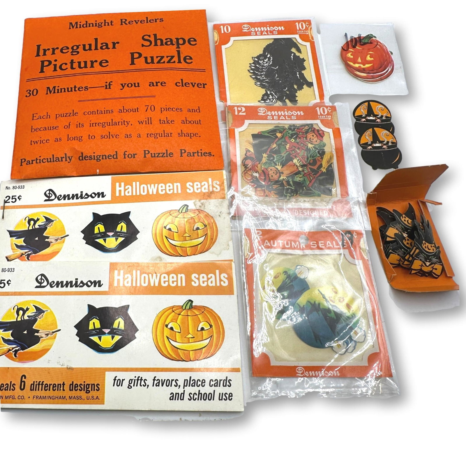 Large Lot of Dennison's Vintage Halloween Seals and Stickers: Low Estimate $100 - High Estimate $200. The Halloween Seals Booklets are missing some seals, but most are still intact. Seals in the other packages have not been counted. It is unknown as to whether t