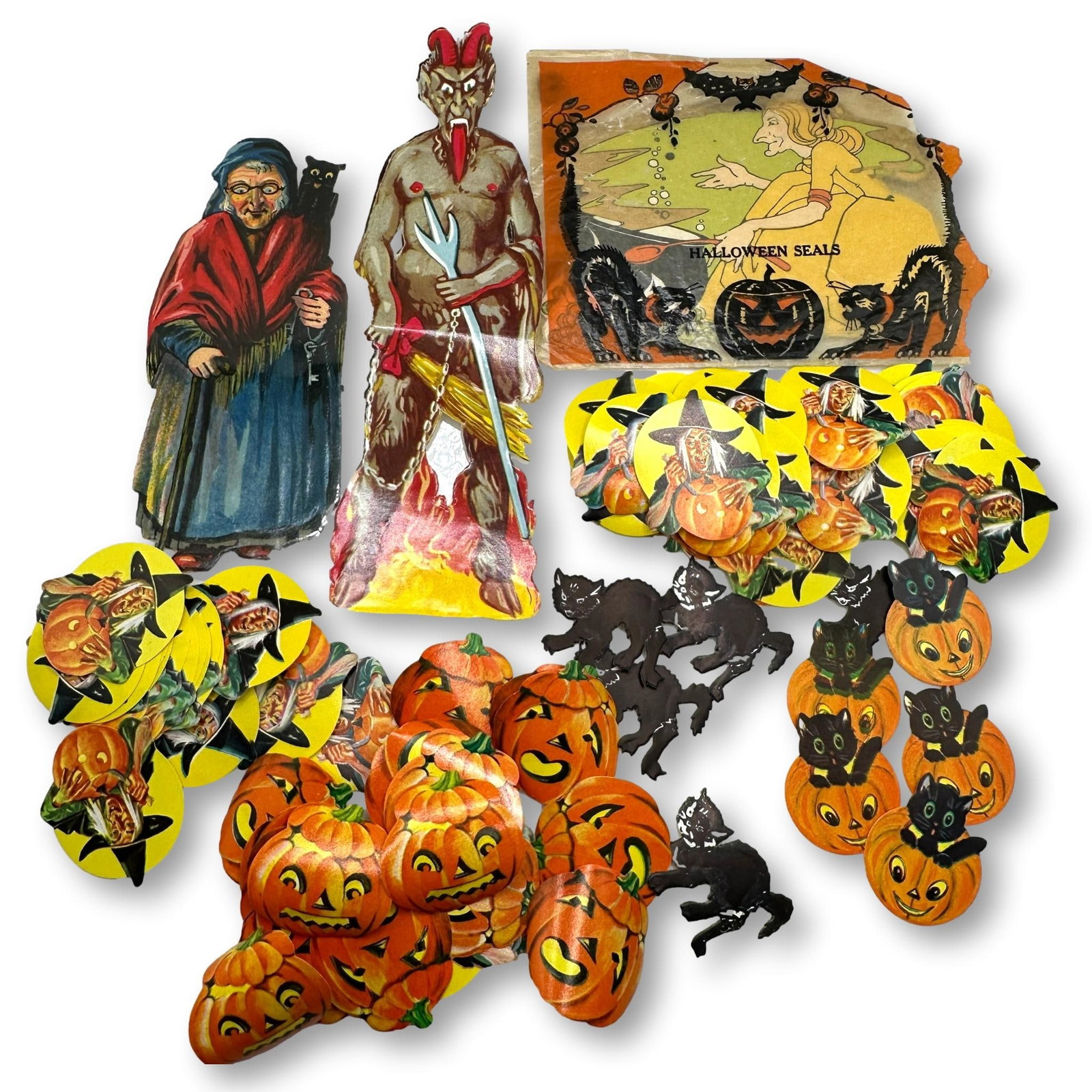 Excellent Lot of Dennison & Others Halloween Seals and Stickers: Low Estimate $100 - High Estimate $200. All lots in this auction come from a lifetime of collecting Halloween and Christmas memorabilia. Our collector has amassed some of the rarest and hard to find i