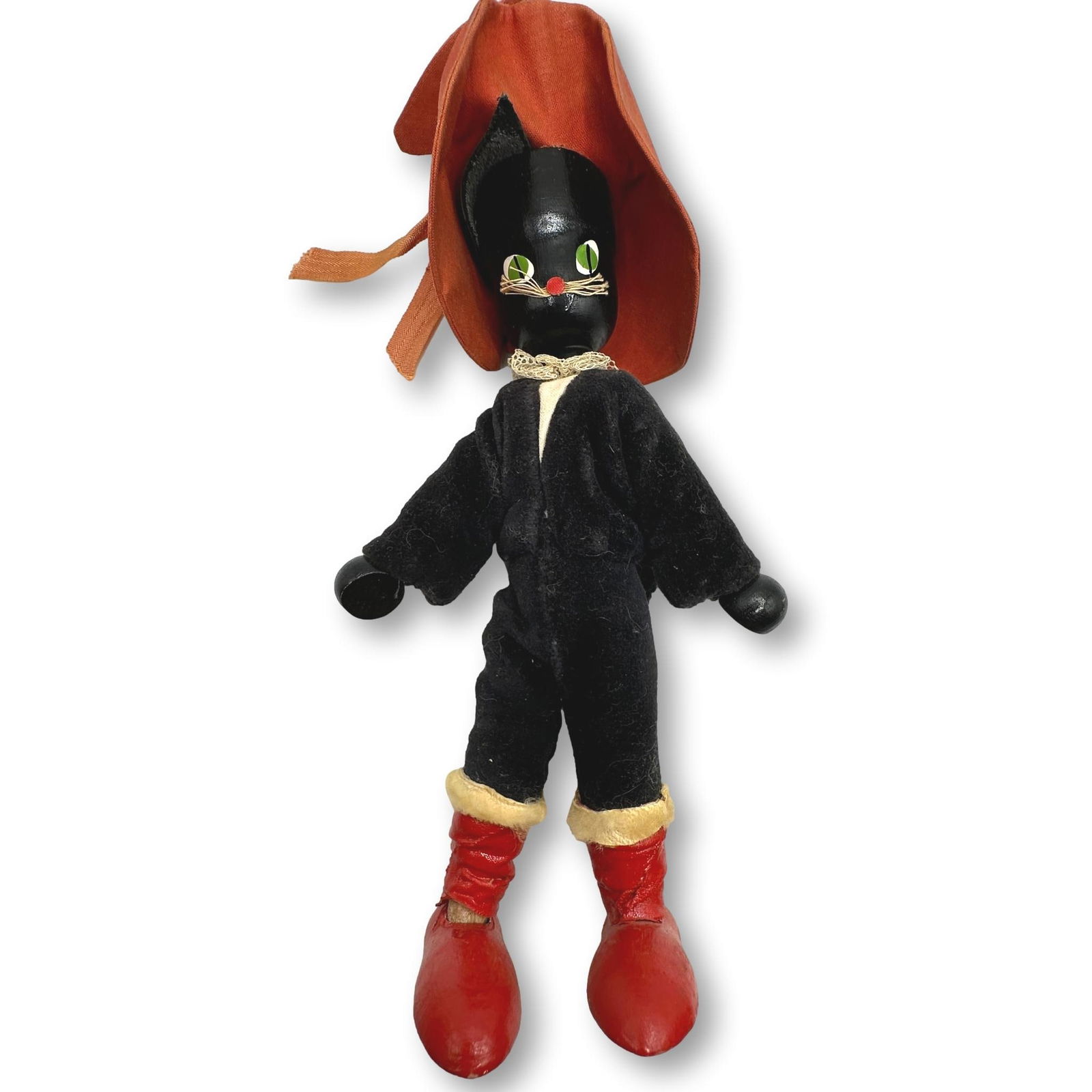 Vintage Puss in Boots Wooden and Cloth Figurine Made in Poland: Low Estimate $100 - High Estimate $200. Measures 9 1/2" tall. All lots in this auction come from a lifetime of collecting Halloween and Christmas memorabilia. Our collector has amassed some of the rar