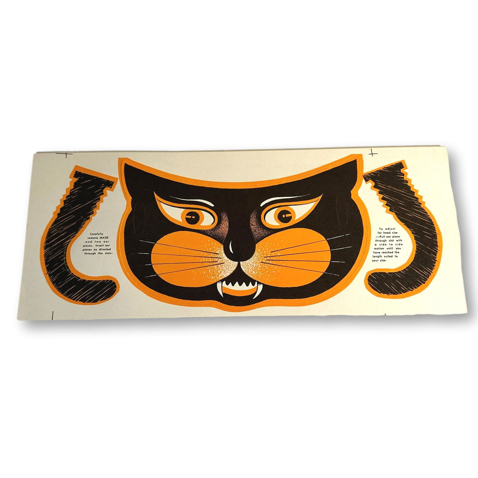 Vintage Cutout Black Cat Masks: Low Estimate $100 - High Estimate $200. Each sheet measures 13 3/4" wide by 5 1/2" tall. All lots in this auction come from a lifetime of collecting Halloween and Christmas memorabilia. Our collector