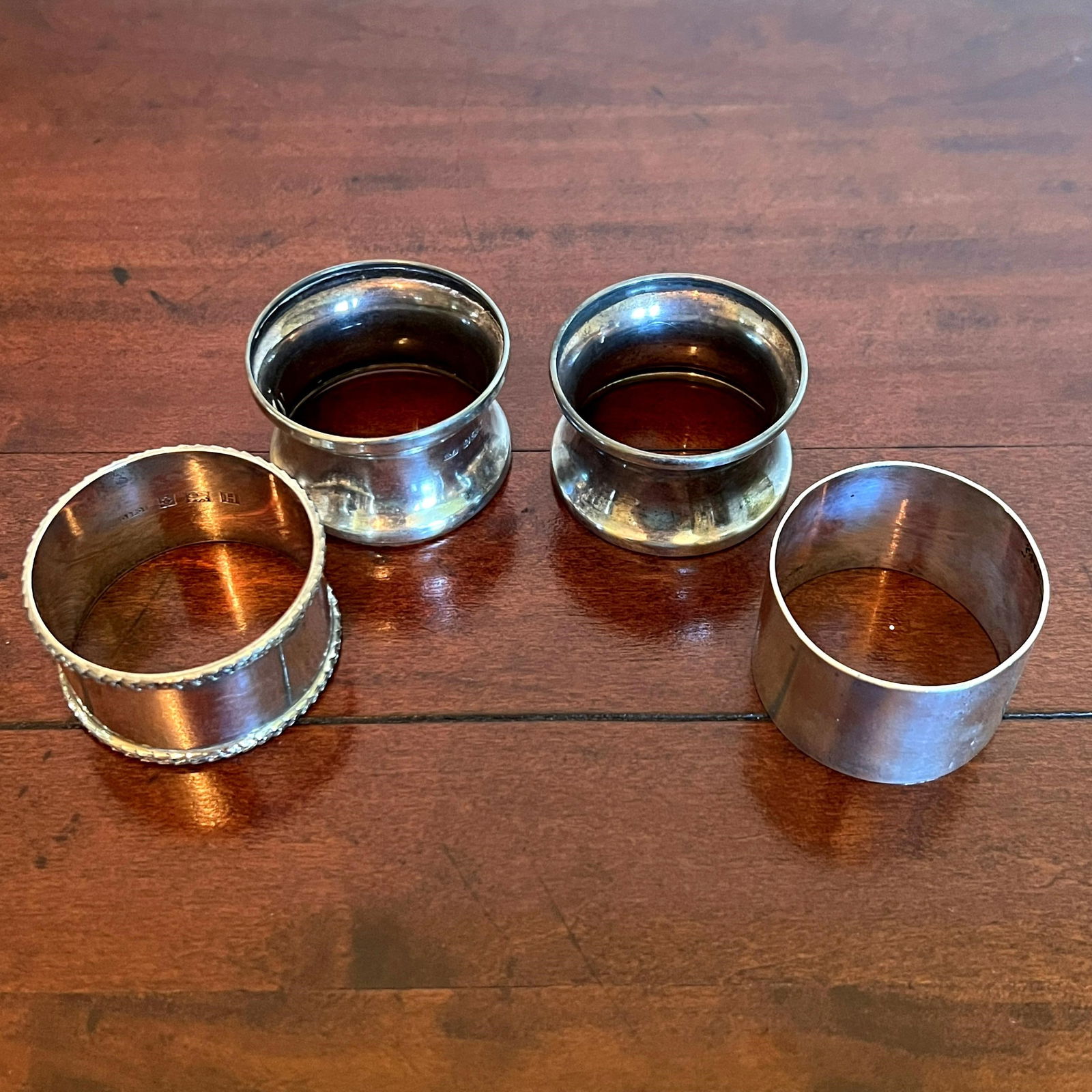 Antique Sterling Silver Napkin Rings with English Hallmarks: Total weight is 3.2 regular ounces. Refer to photos for additional condition information as they are a part of the description. Please note lots may show signs of wear commensurate with age and use, a