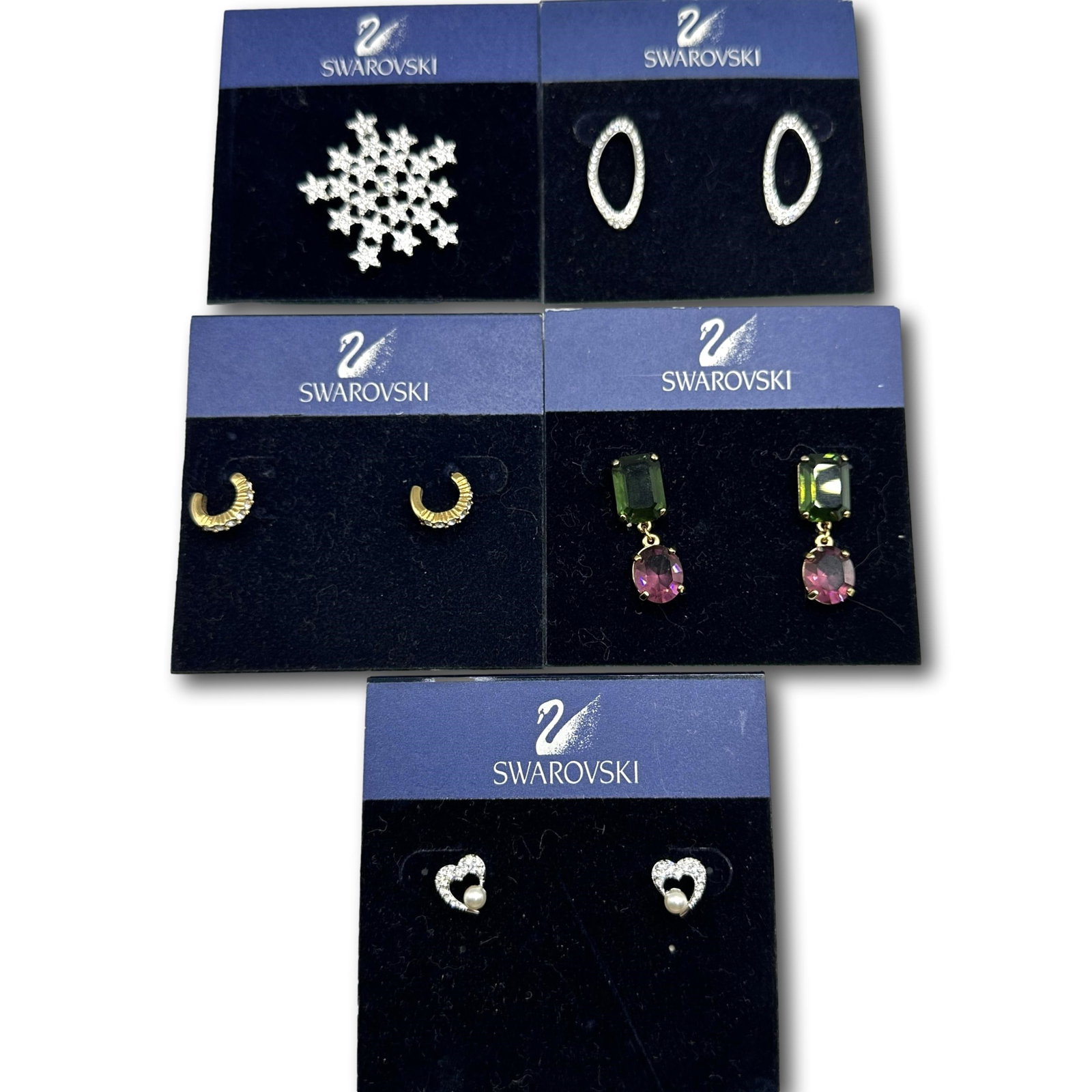 Group of Swarovski Crystal Earrings: Refer to photos for additional condition information as they are a part of the description. Please note lots may show signs of wear commensurate with age and use, and the lack of a statement regarding