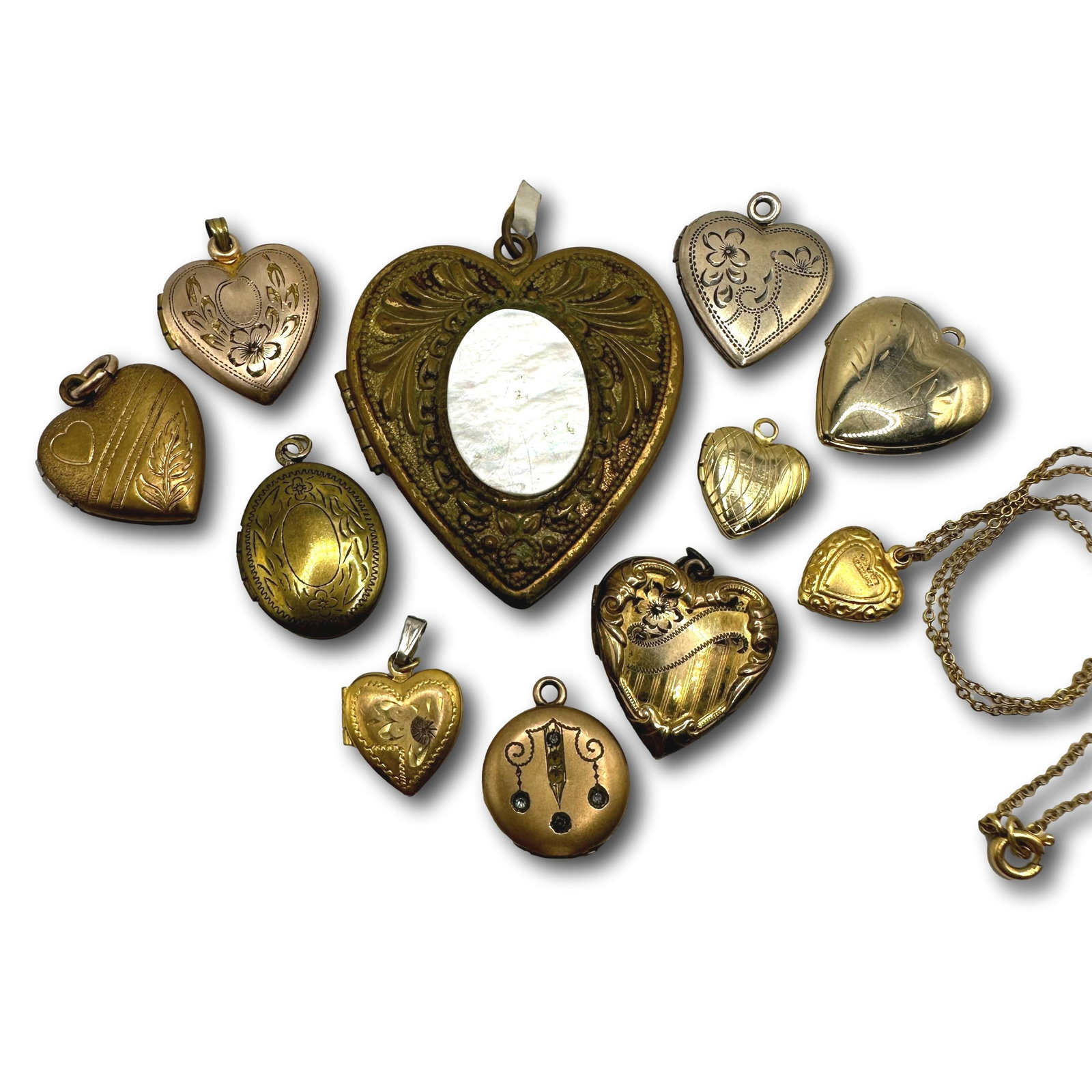 Group of Gold Filled Heart Lockets: Refer to photos for additional condition information as they are a part of the description. Please note lots may show signs of wear commensurate with age and use, and the lack of a statement regarding