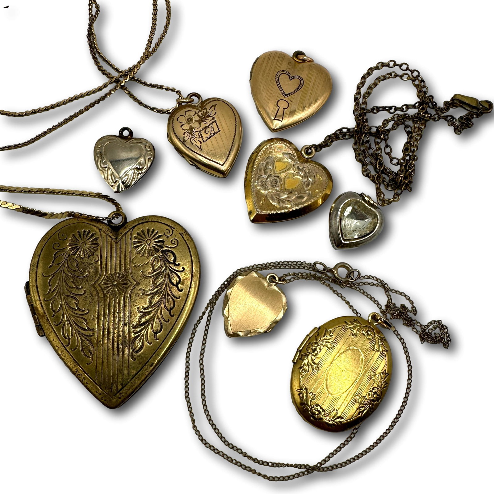 Collection of Vintage Gold Filled Heart Necklaces and Pendant Lockets: Refer to photos for additional condition information as they are a part of the description. Please note lots may show signs of wear commensurate with age and use, and the lack of a statement regarding