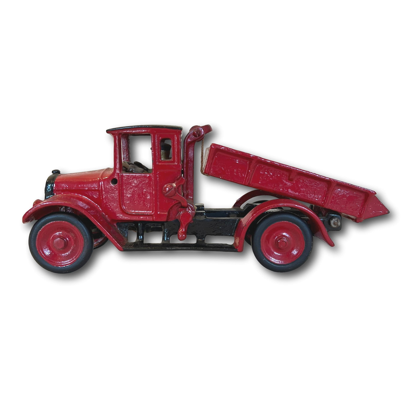 Cast Iron Dump Truck: Refer to photos for additional condition information as they are a part of the description. Please note lots may show signs of wear commensurate with age and use, and the lack of a statement regarding