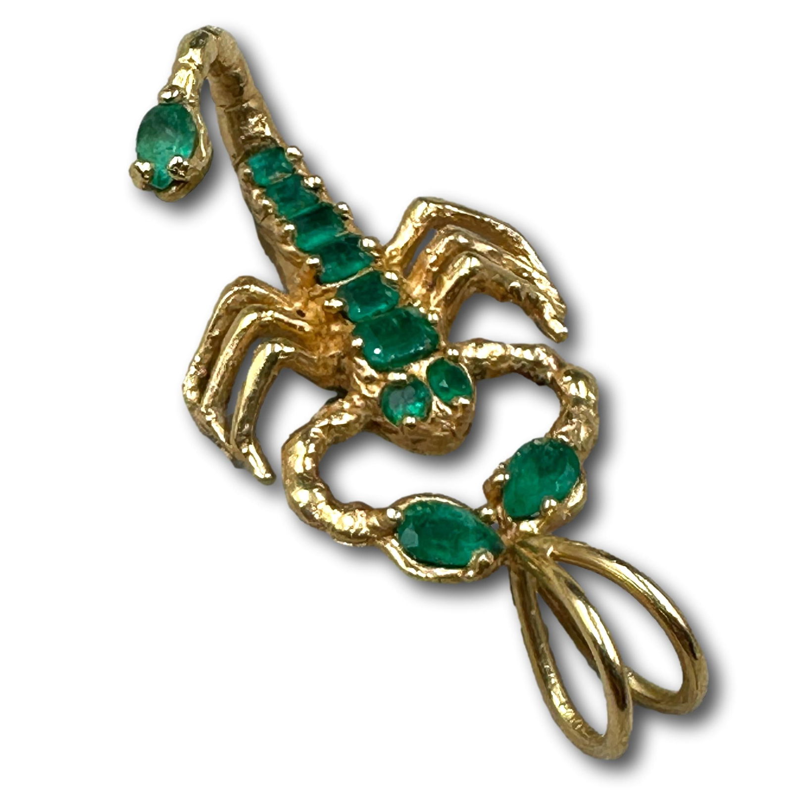 18K Gold and Emerald Scorpion: Weighs 13.7 grams. Measures 2" long. Gold purity verified using an XRF tester. Refer to photos for additional condition information as they are a part of the description. Please note lots may show sig