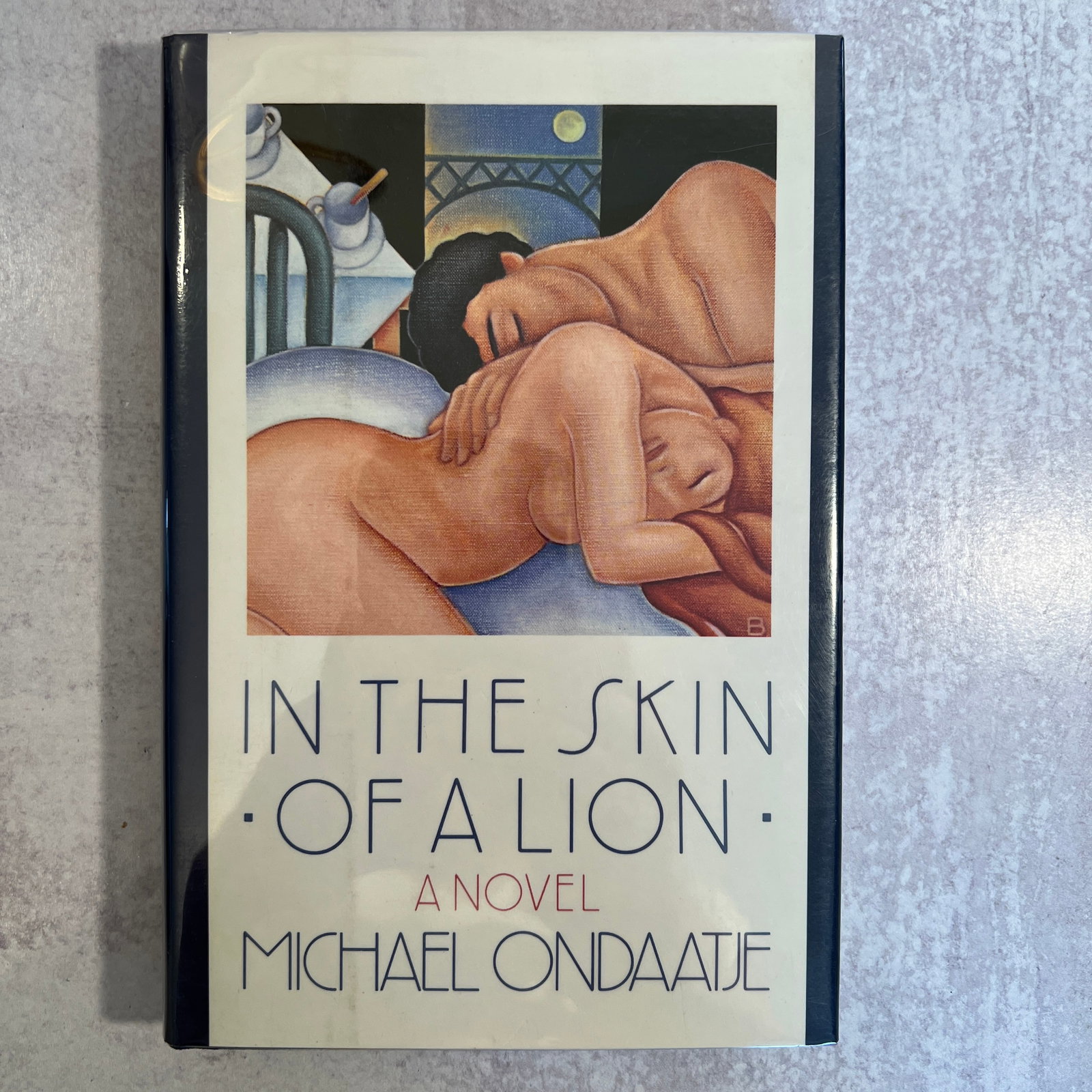 Michael Ondaatje - In the Skin of a Lion, Signed: Michael Ondaatje - In the Skin of a Lion, Signed. Refer to photos for additional condition information as they are a part of the description. Please note lots may show signs of wear commensurate with 