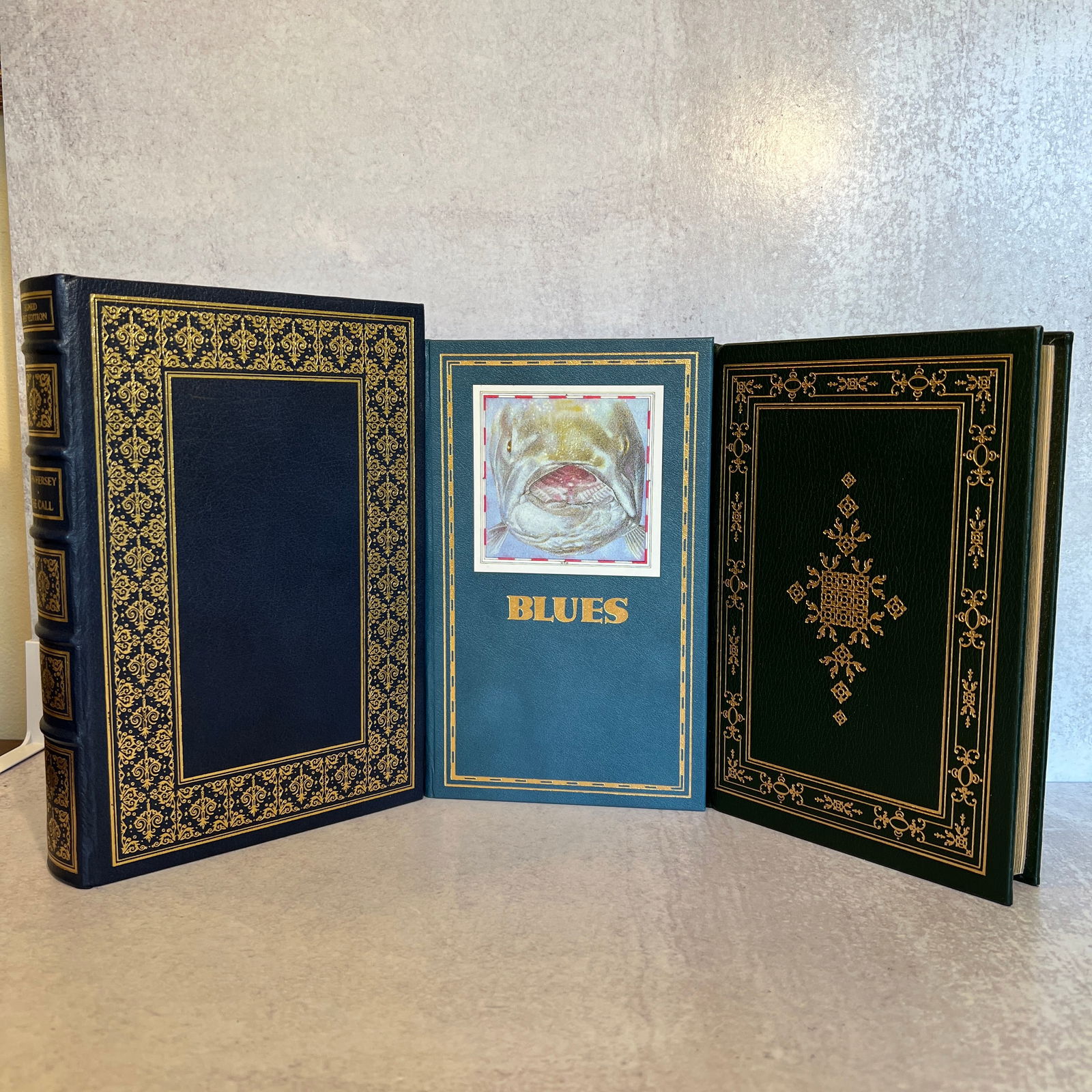 John Hersey - Three Franklin Library Signed Books: Includes: Blues - 1987, The Collection - 1985, A Bell for Adano - 1978. All three are Franklin Library Signed First Edition books. Refer to photos for additional condition information as they are a pa