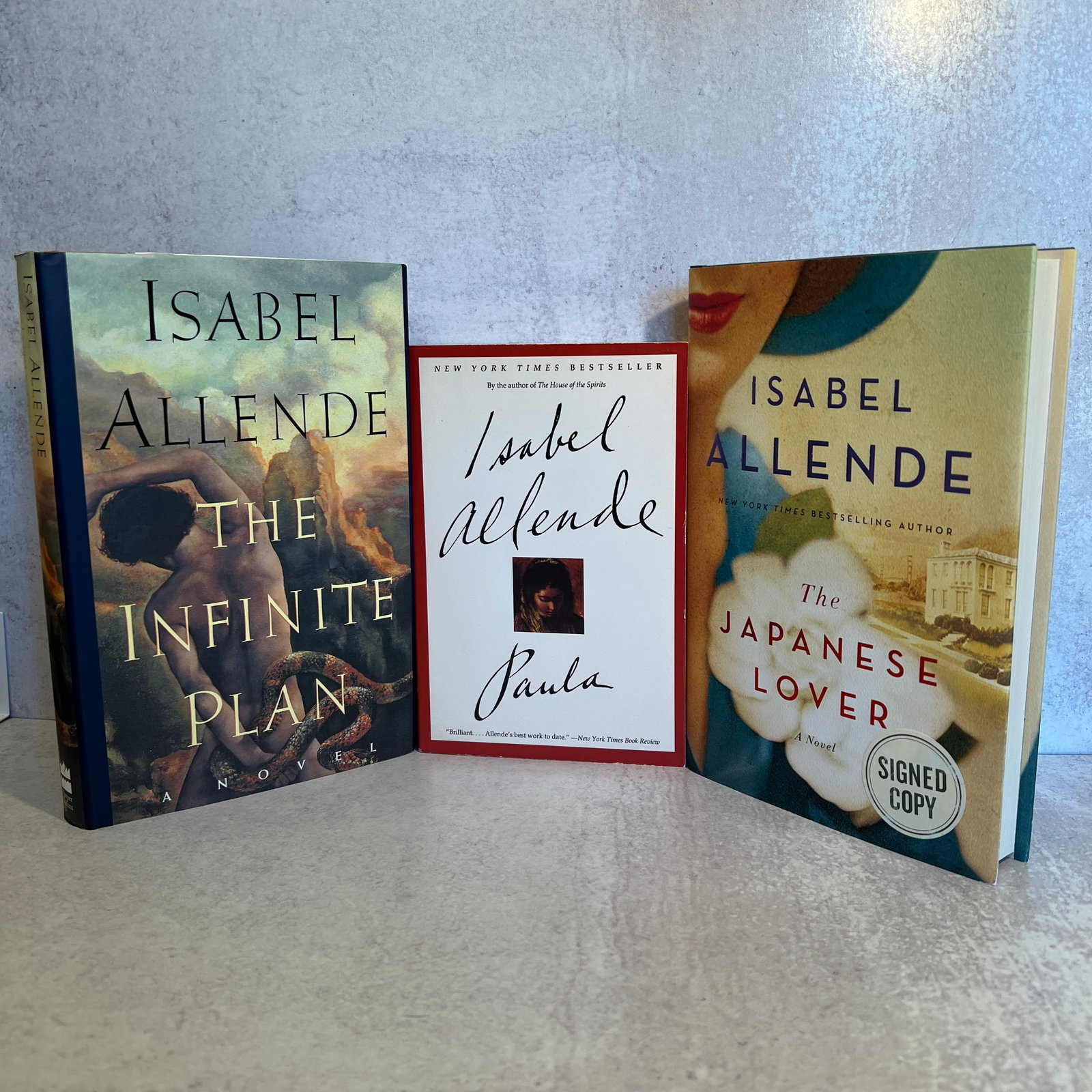 Isabelle Allende - Japanese Lover, Infinite Plan, Paula - Signed Books: The Infinite Plan - copyright 1991, signed. The Japanese Lover - copyright 2015 signed. Paula (paperback), copyright 1994, signed. Refer to photos for additional condition information as they are a pa
