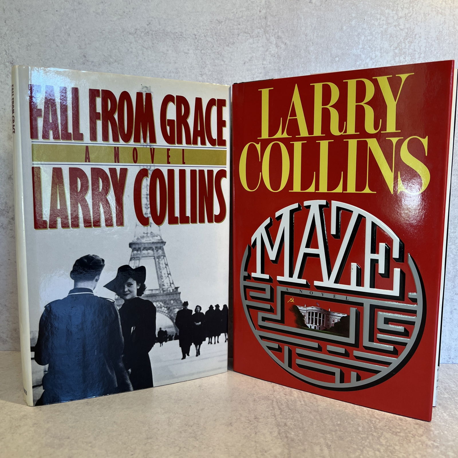 Larry Collins Autographed Fall from Grace and Maze: Fall From Grace - copyright 1985, and Maze - copyright 1989 - both signed by the author. Refer to photos for additional condition information as they are a part of the description. Please note lots ma