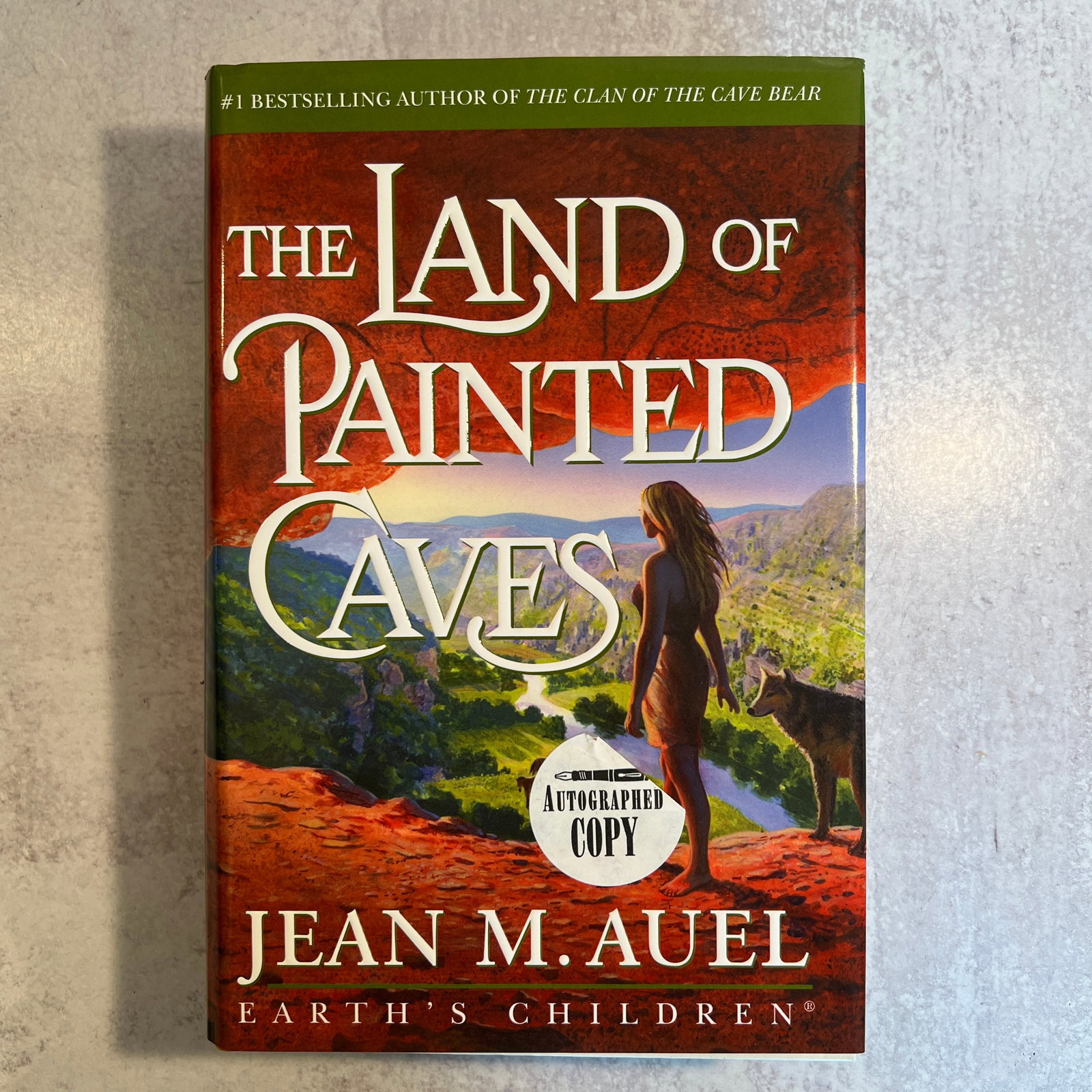 Jean M. Auel Autographed "The Land of Painted Caves": Jean M. Auel Autographed "The Land of Painted Caves" - Copyright 2011, first edition. Refer to photos for additional condition information as they are a part of the description. Please note lots may s