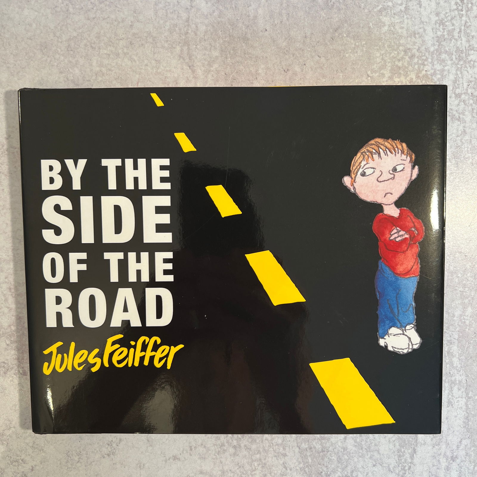 Jules Feiffer - By The Side of the Road, Autographed: Jules Feiffer - By The Side of the Road, Autographed. Refer to photos for additional condition information as they are a part of the description. Please note lots may show signs of wear commensurate w