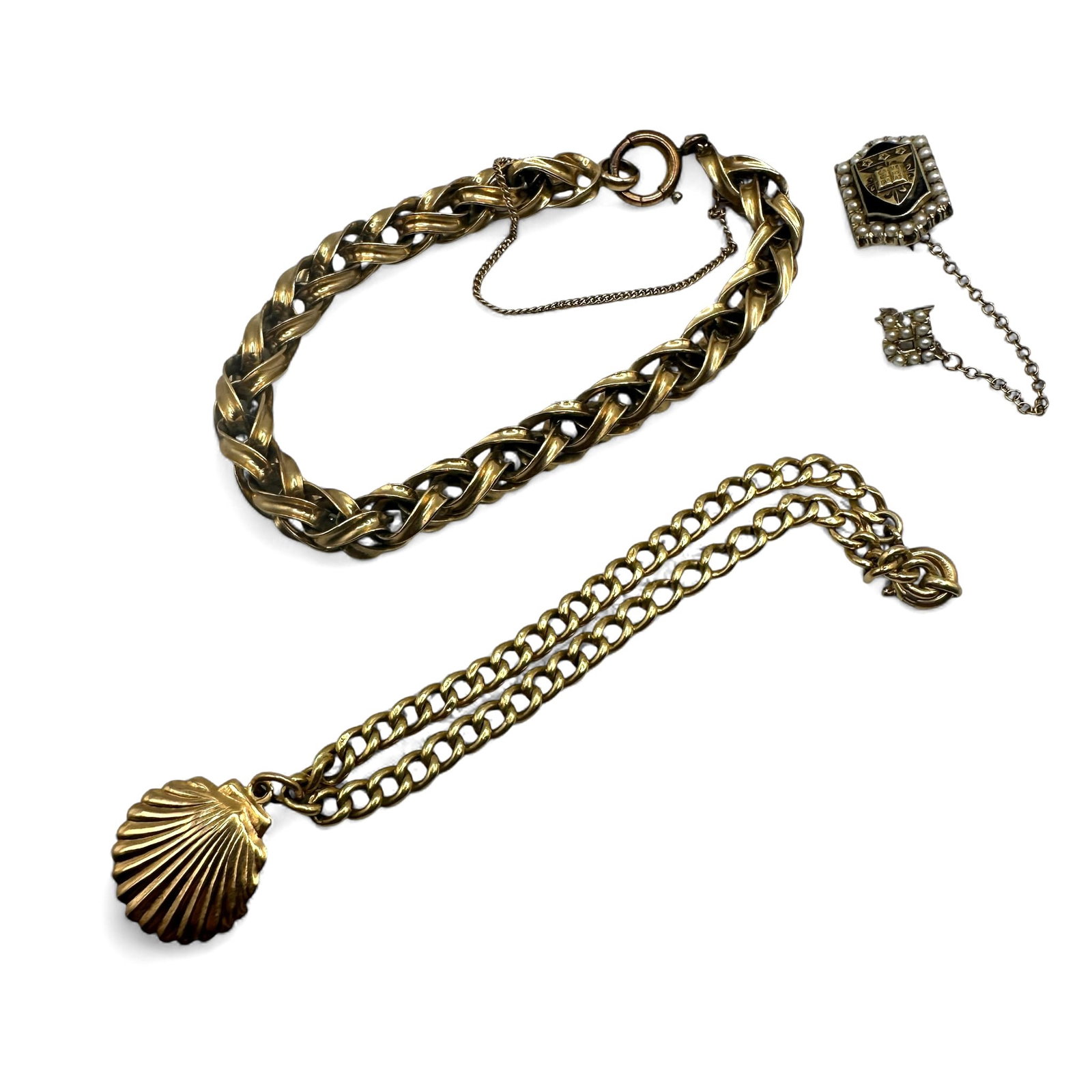 A Collection of Vintage Gold Filled Jewelry: Total weight 29 grams. Refer to photos for additional condition information as they are a part of the description. Please note lots may show signs of wear commensurate with age and use, and the lack o