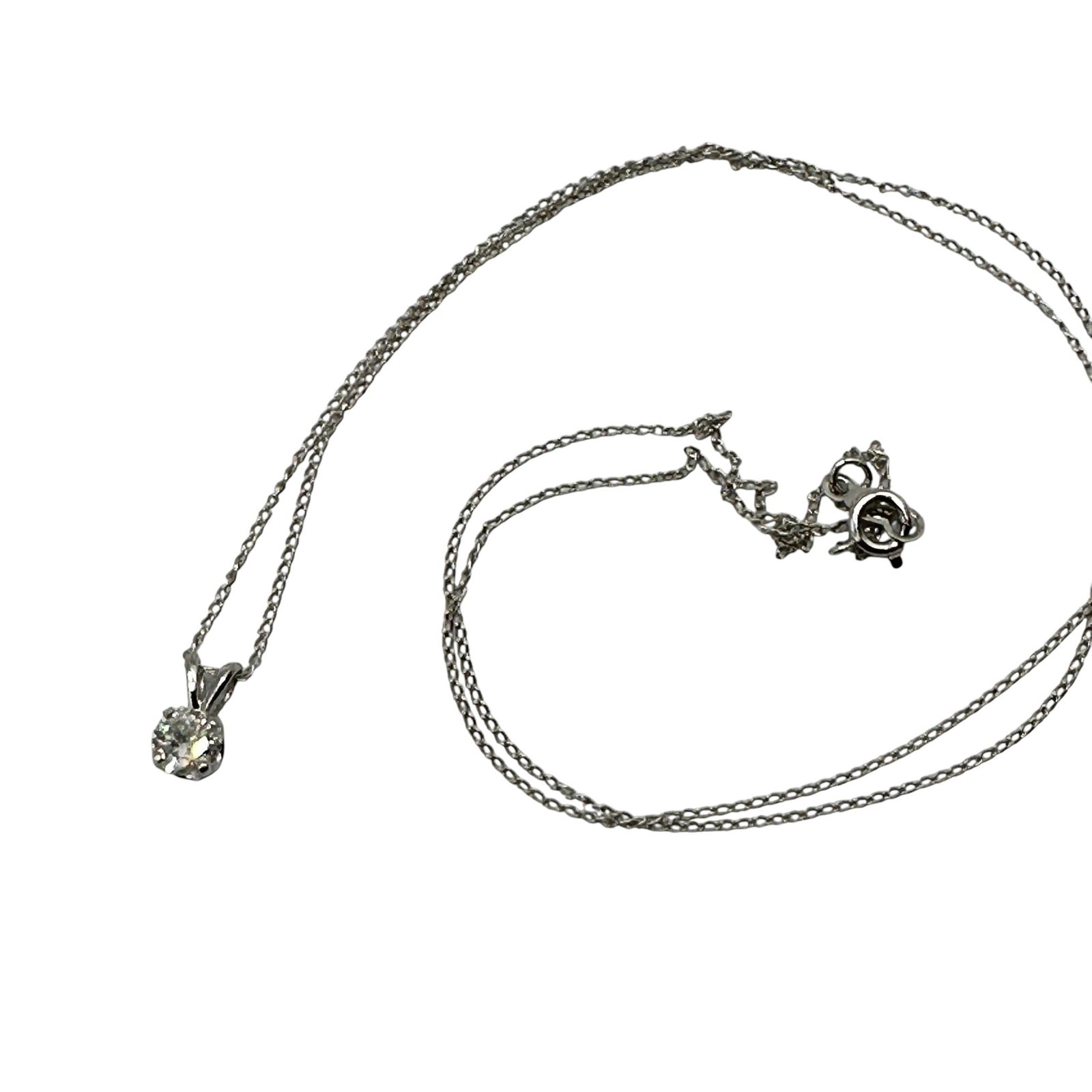 14K White Gold and Diamond Necklace: Total weight less than one gram. Diamond measures approximately 1/4 carat. Chain measures 18" from end to end. Winning Bidders! To bypass LiveShipping, and use our In-House shipping service, please ch