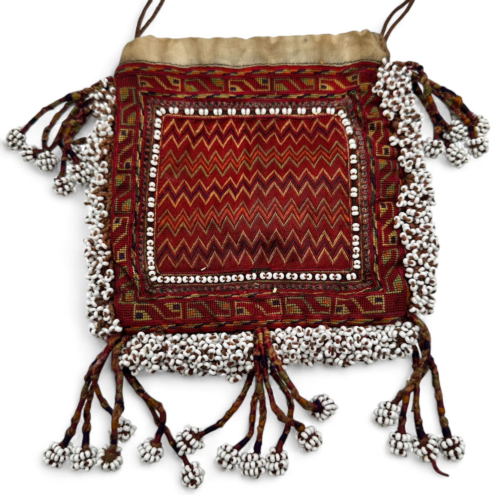 Vintage Tobacco Pouch - Indus Kohistan Pakistan: Measures 7"H including fringe x 6" wide. Handle drop is 5 1/2". Refer to photos for additional condition information as they are a part of the description. Please note lots may show signs of wear comm
