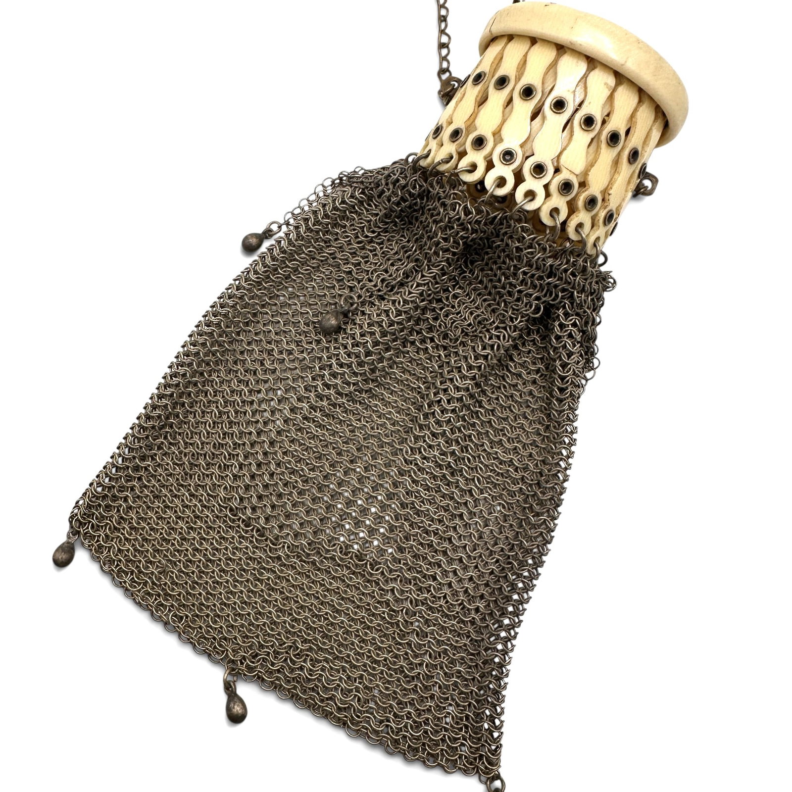Rare Antique Cellulose Gate Top Metal Mesh Purse: Unusual to see the top hardware in a faux ivory cellulose material. Cellulose shows some loss to the outer rim. Measures 6" tall x 4" wide. Refer to photos for additional condition information as they
