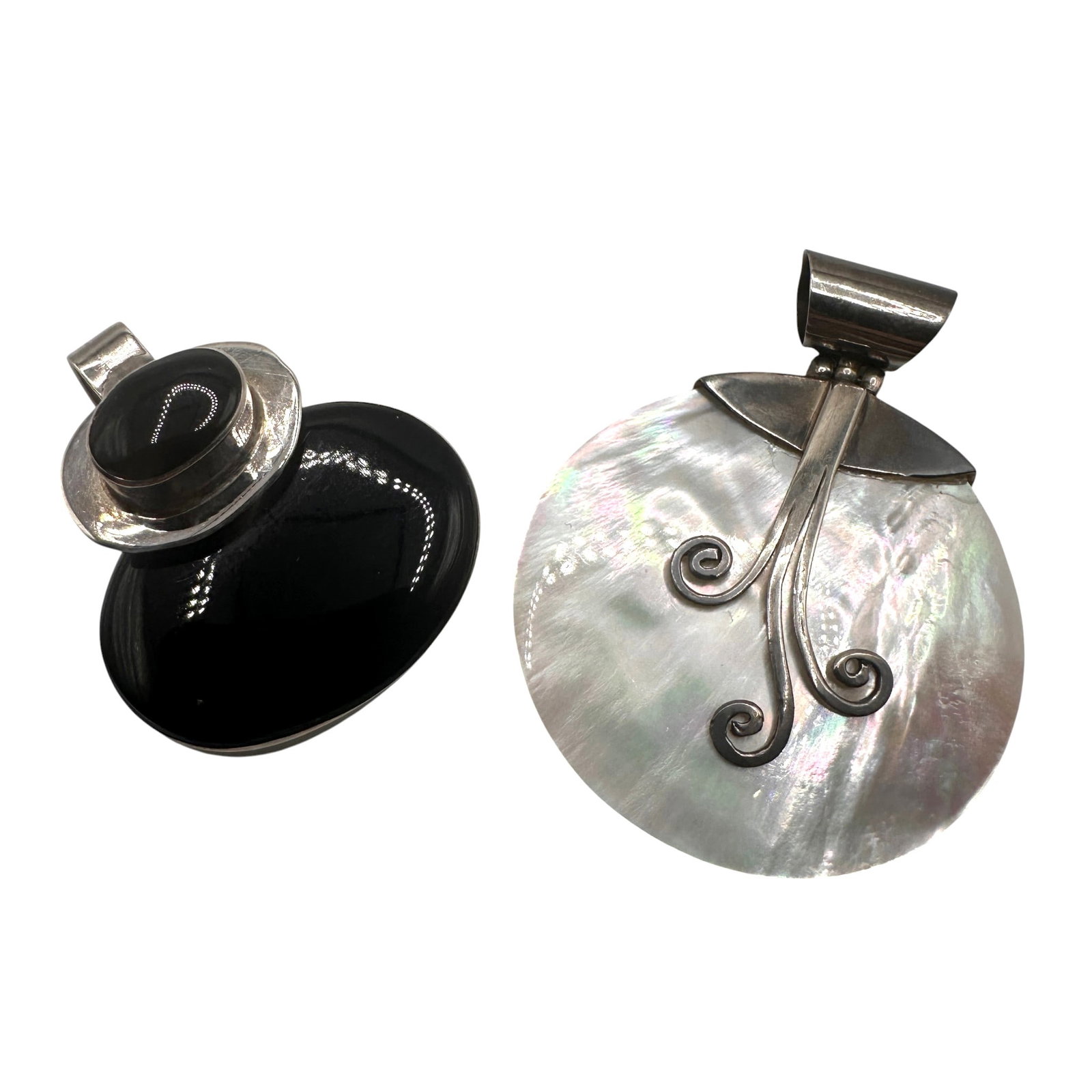 Pair of Sterling Silver Mother of Pearl and Onyx Pendants: Refer to photos for additional condition information as they are a part of the description. Please note lots may show signs of wear commensurate with age and use, and the lack of a statement regarding
