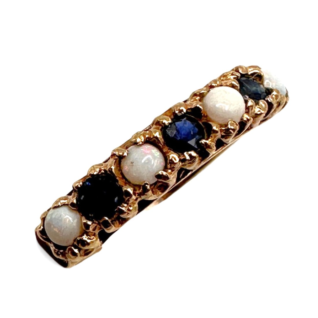 Antique 9K Gold Opal and Blue Sapphire Ring: Ring size 6 3/4. Weighs 2 grams. Refer to photos for additional condition information as they are a part of the description. Please note lots may show signs of wear commensurate with age and use, and 
