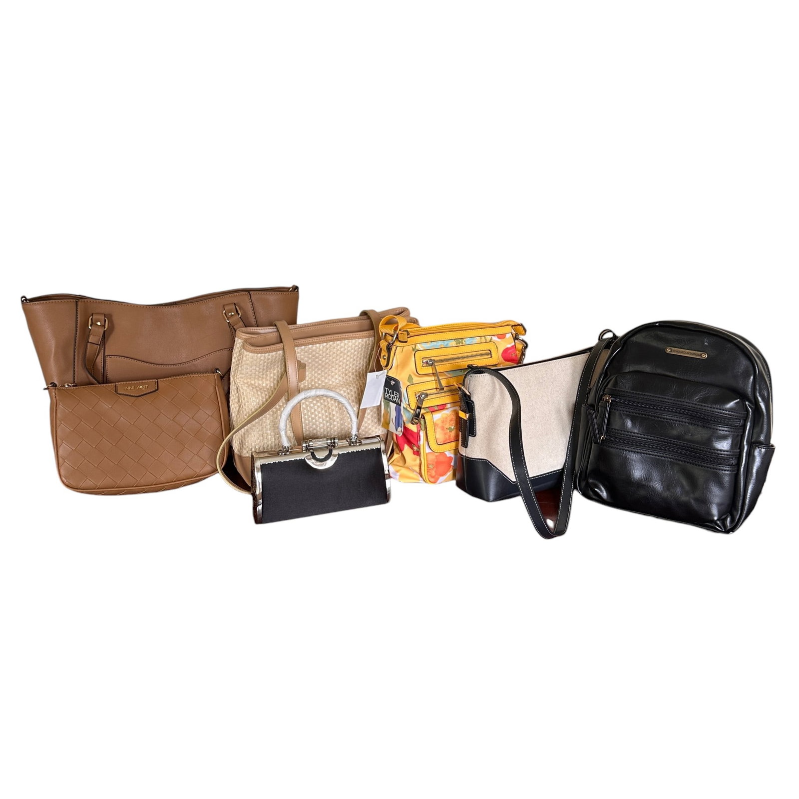 Lot of New with Tags Handbags Including Claiborne, Aigner: Refer to photos for additional condition information as they are a part of the description. Please note lots may show signs of wear commensurate with age and use, and the lack of a statement