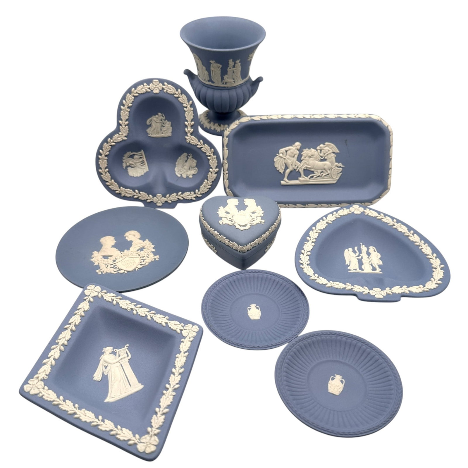 Lot of Vintage Blue Wedgwood Trinket Dishes: Cigarette urn has chip to rim as shown in photos. Refer to photos for additional condition information as they are a part of the description. Please note lots may show signs of wear commensurate with 